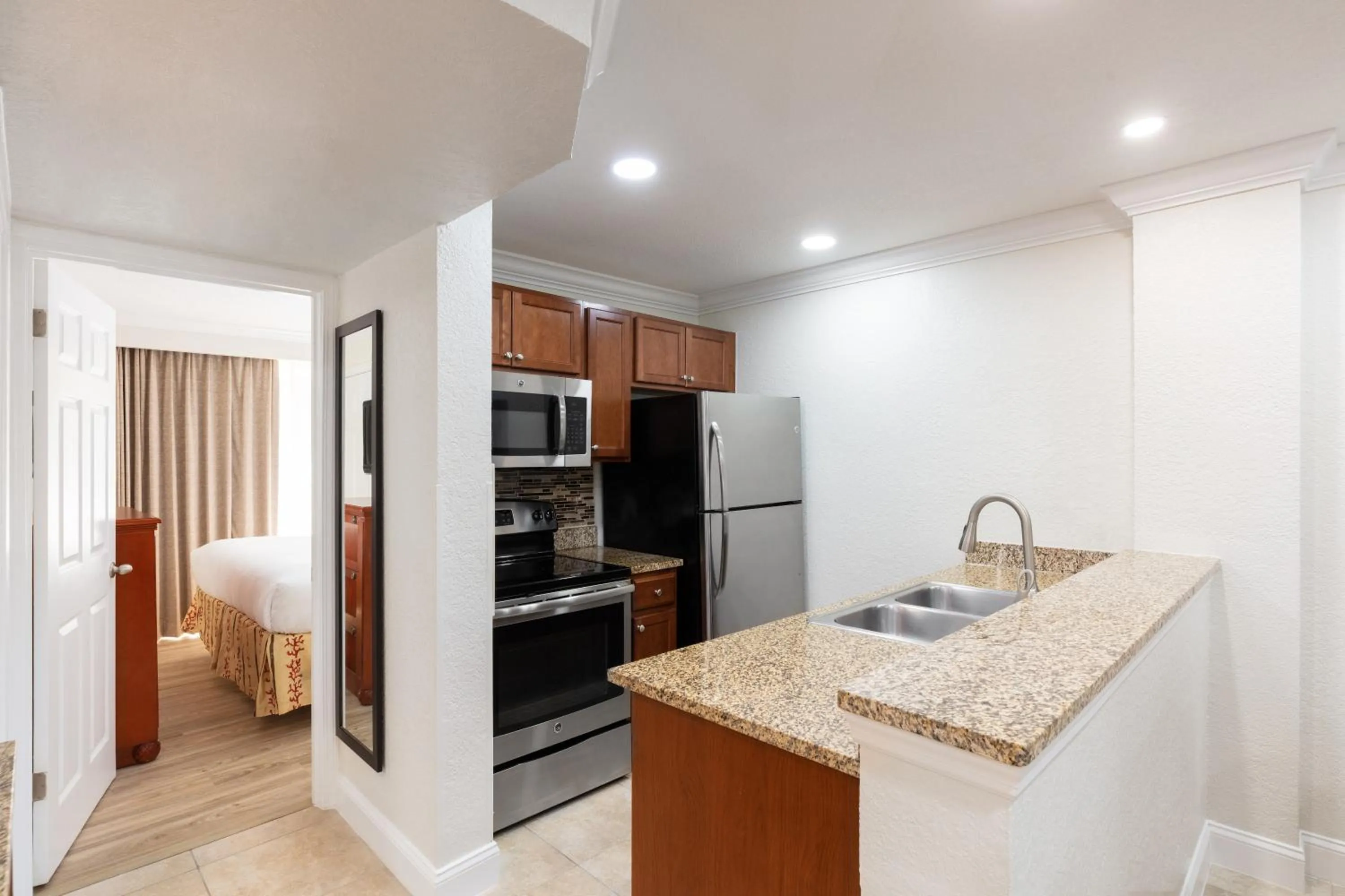 Kitchen or kitchenette, Bed in Westgate Blue Tree Resort