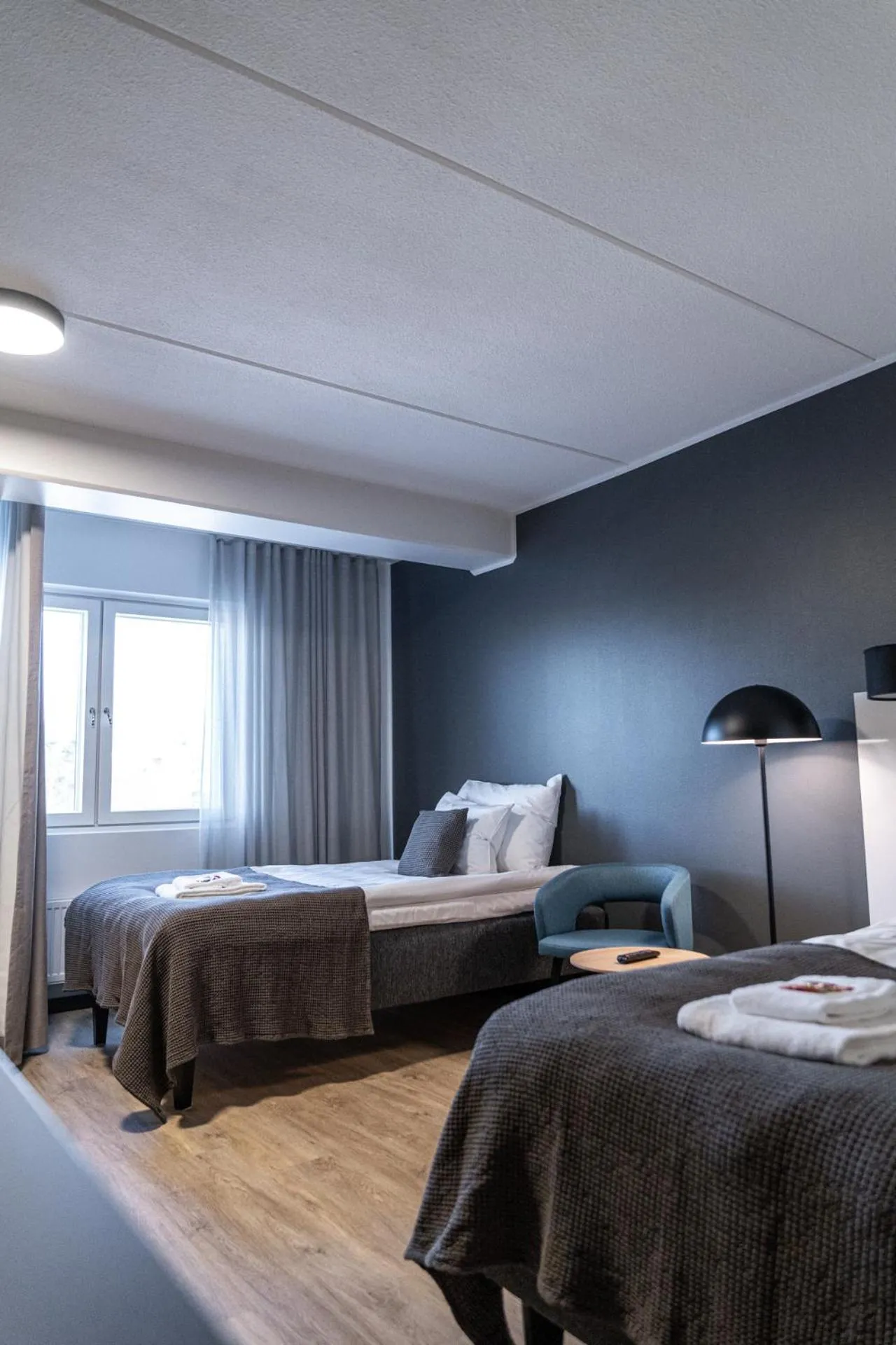 Bedroom, Bed in Hotelli Sointu by UHANDA