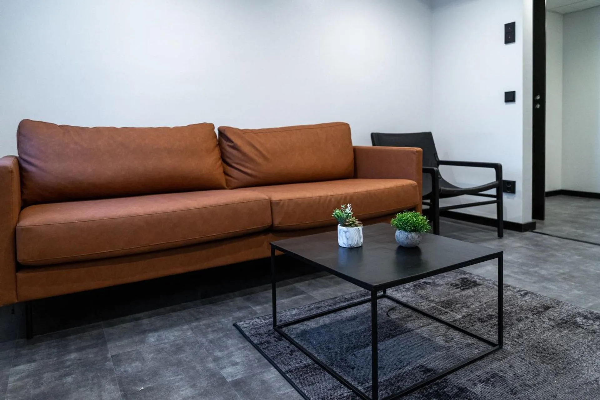 Living room in Hotelli Sointu by UHANDA