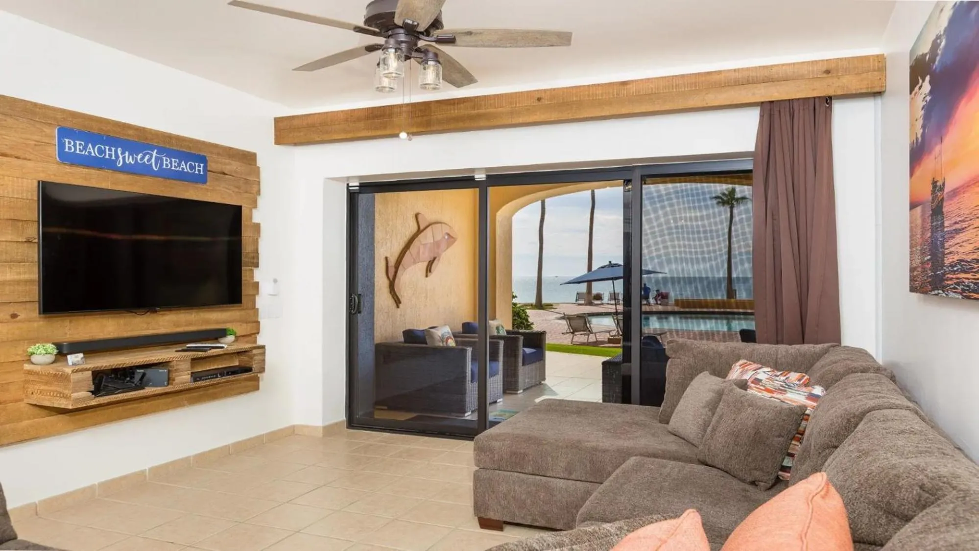 Living room in Ground Floor 2BR Beachfront - Steps to Pool - Princesa E104 - BeachBumCondos