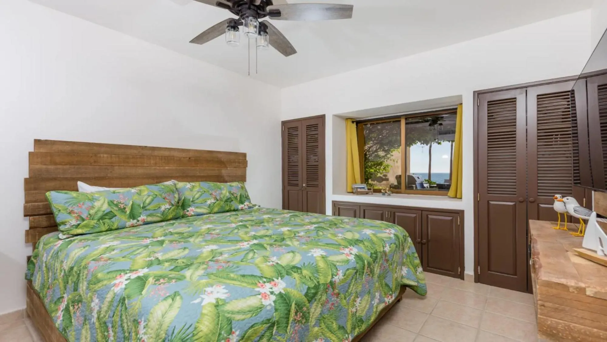 Bed in Ground Floor 2BR Beachfront - Steps to Pool - Princesa E104 - BeachBumCondos