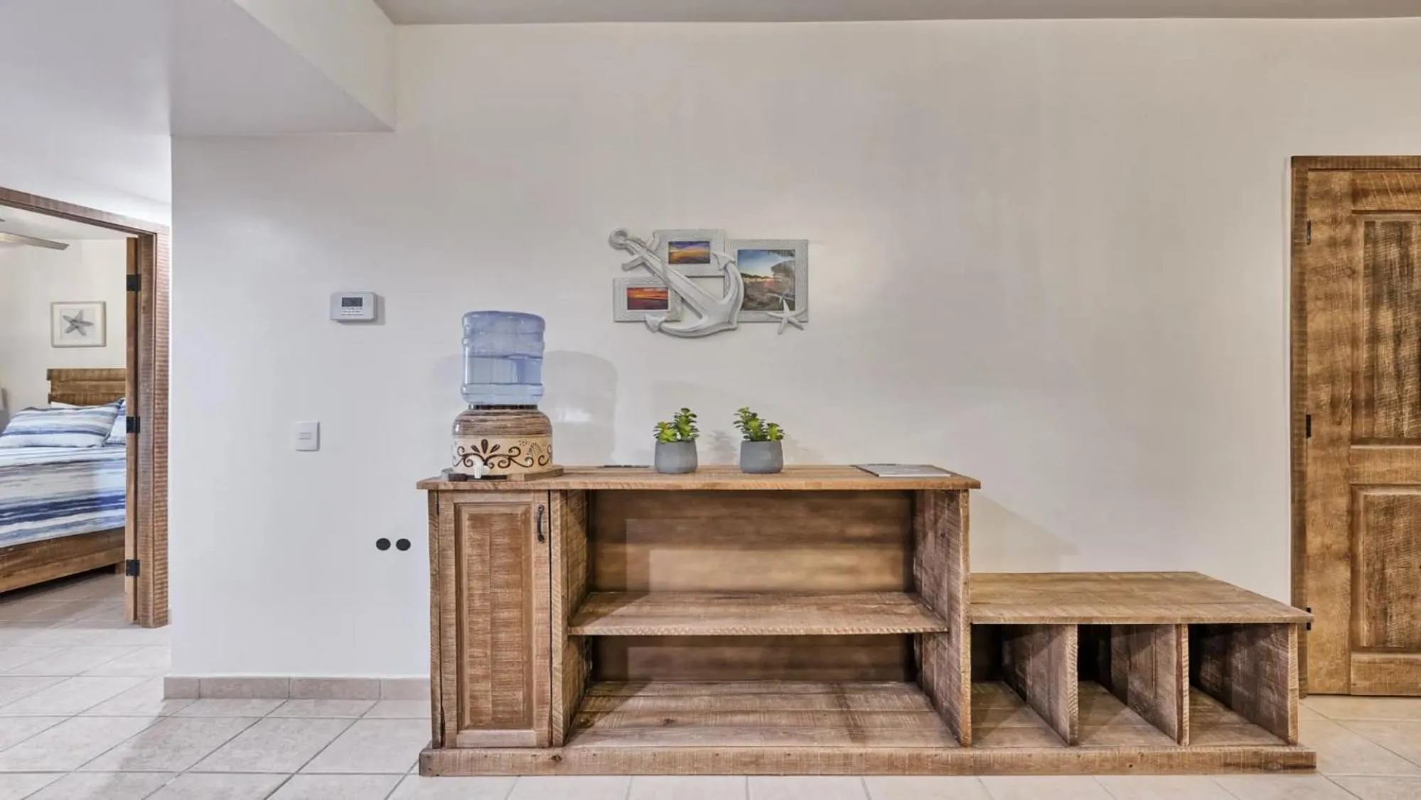 Living room, Bed in Ground Floor 2BR Beachfront - Steps to Pool - Princesa E104 - BeachBumCondos