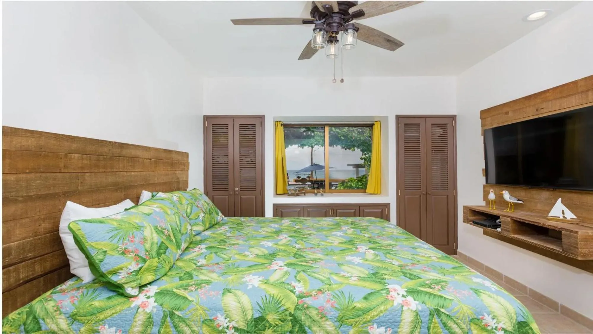 Bed in Ground Floor 2BR Beachfront - Steps to Pool - Princesa E104 - BeachBumCondos