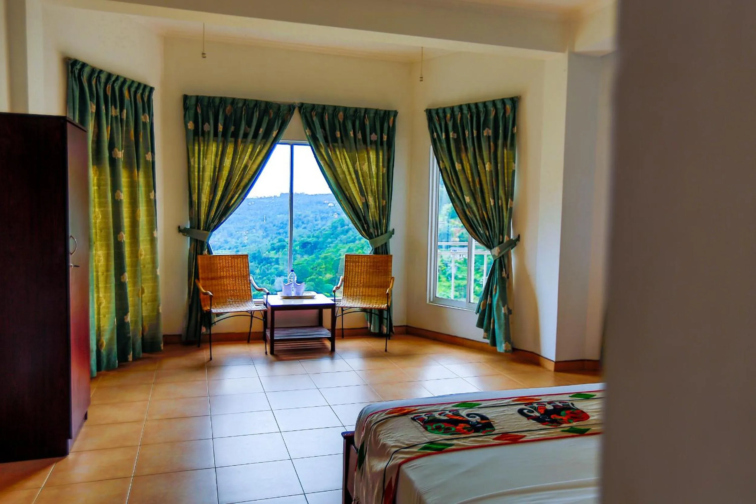 Seating area, Bed in Thuruliya Hotel