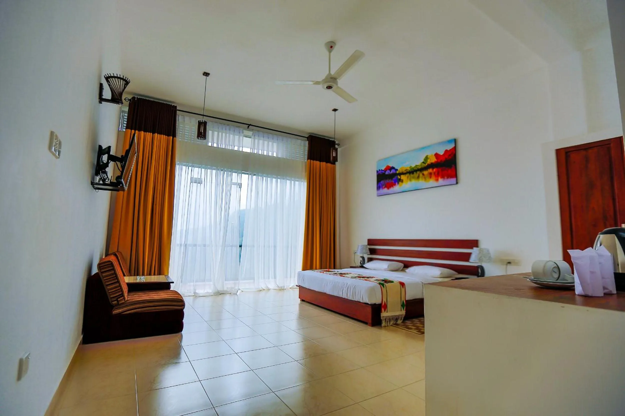 Living room, Bed in Thuruliya Hotel