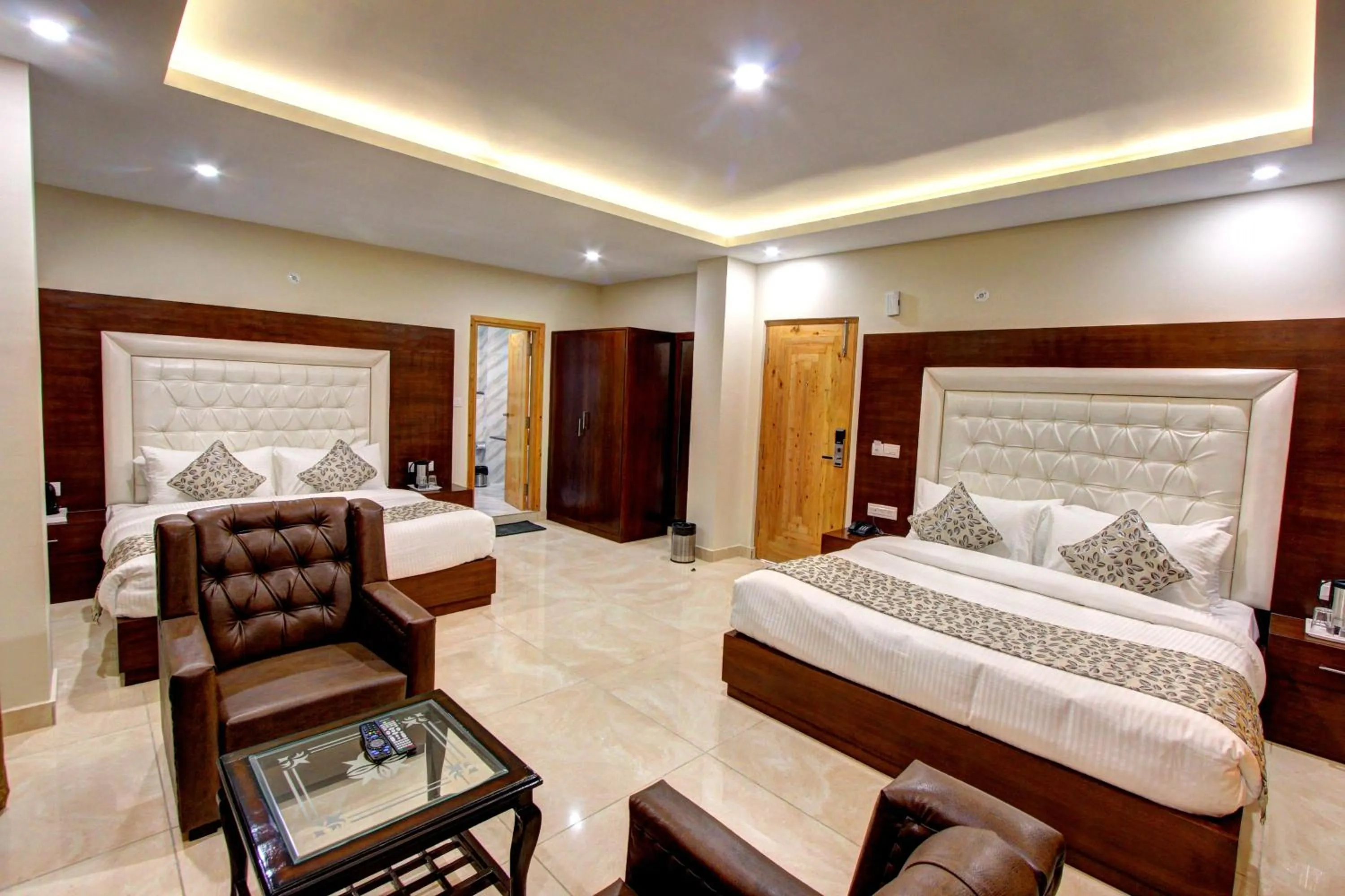 Photo of the whole room, Bed in Regenta Place Green Leaf Manali- A Centrally Heated Resort