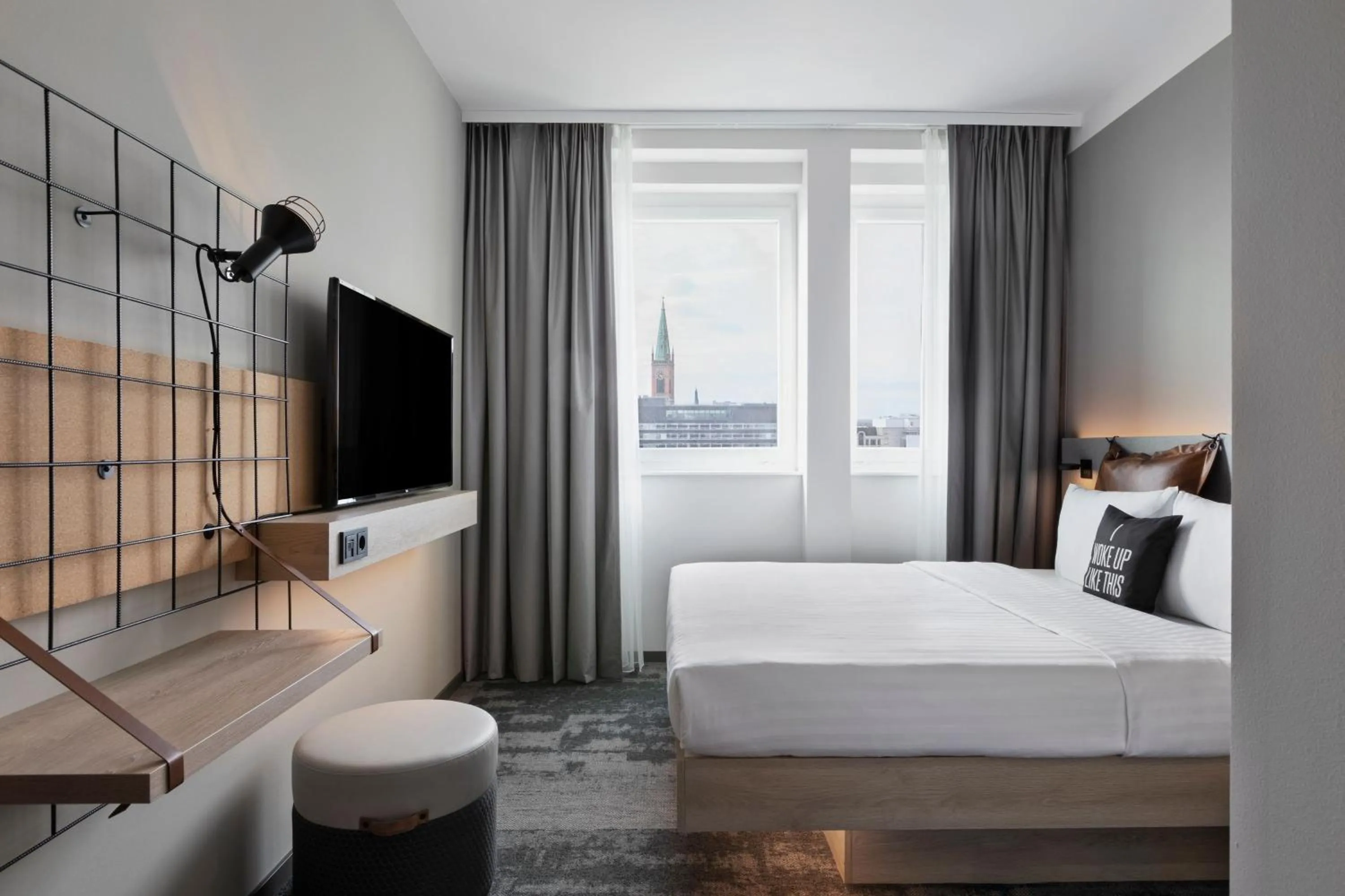 Photo of the whole room, Bed in Moxy Duesseldorf City
