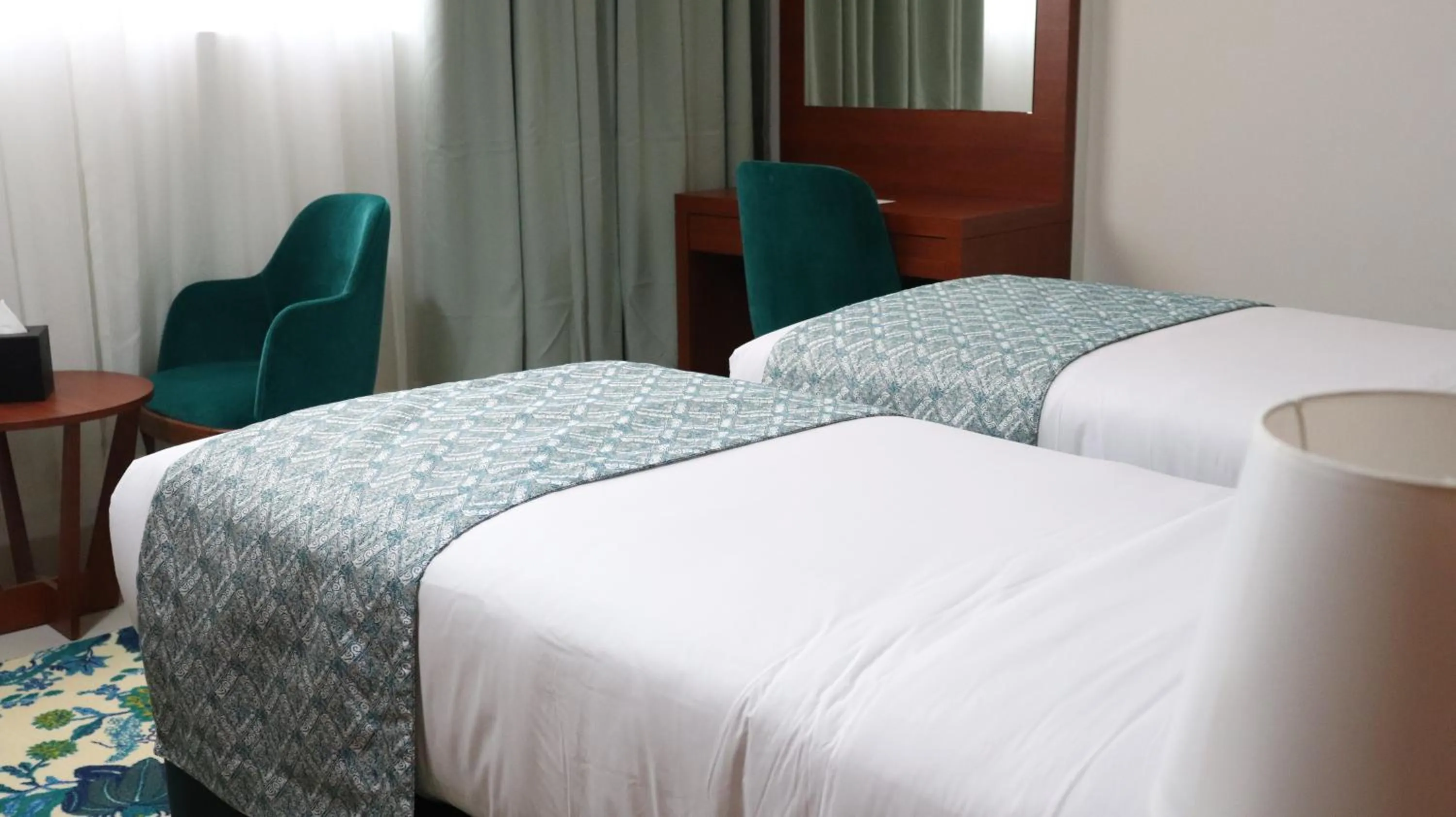 Bed in Al Riyadh Hotel Apartments