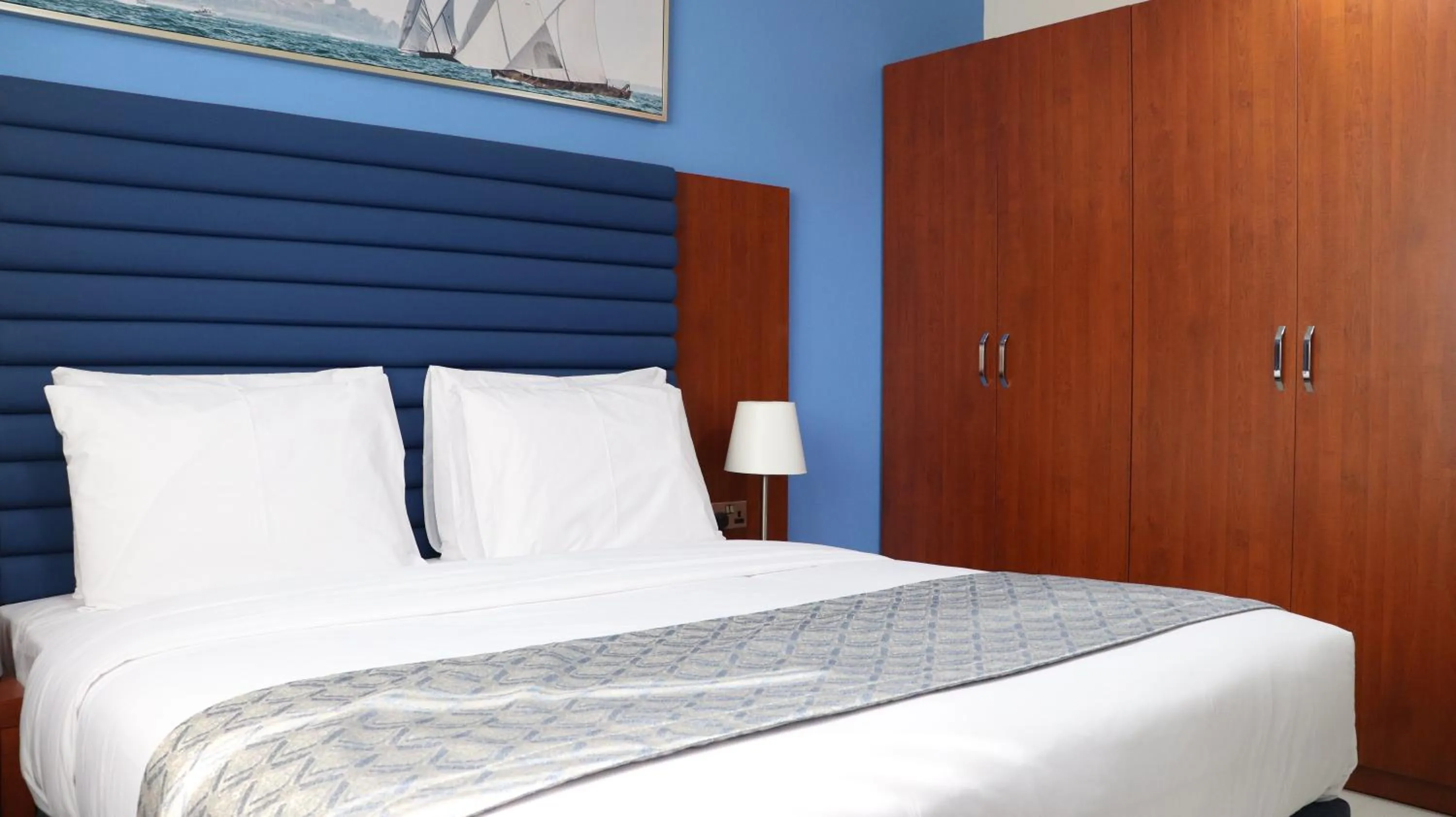 Bed in Al Riyadh Hotel Apartments