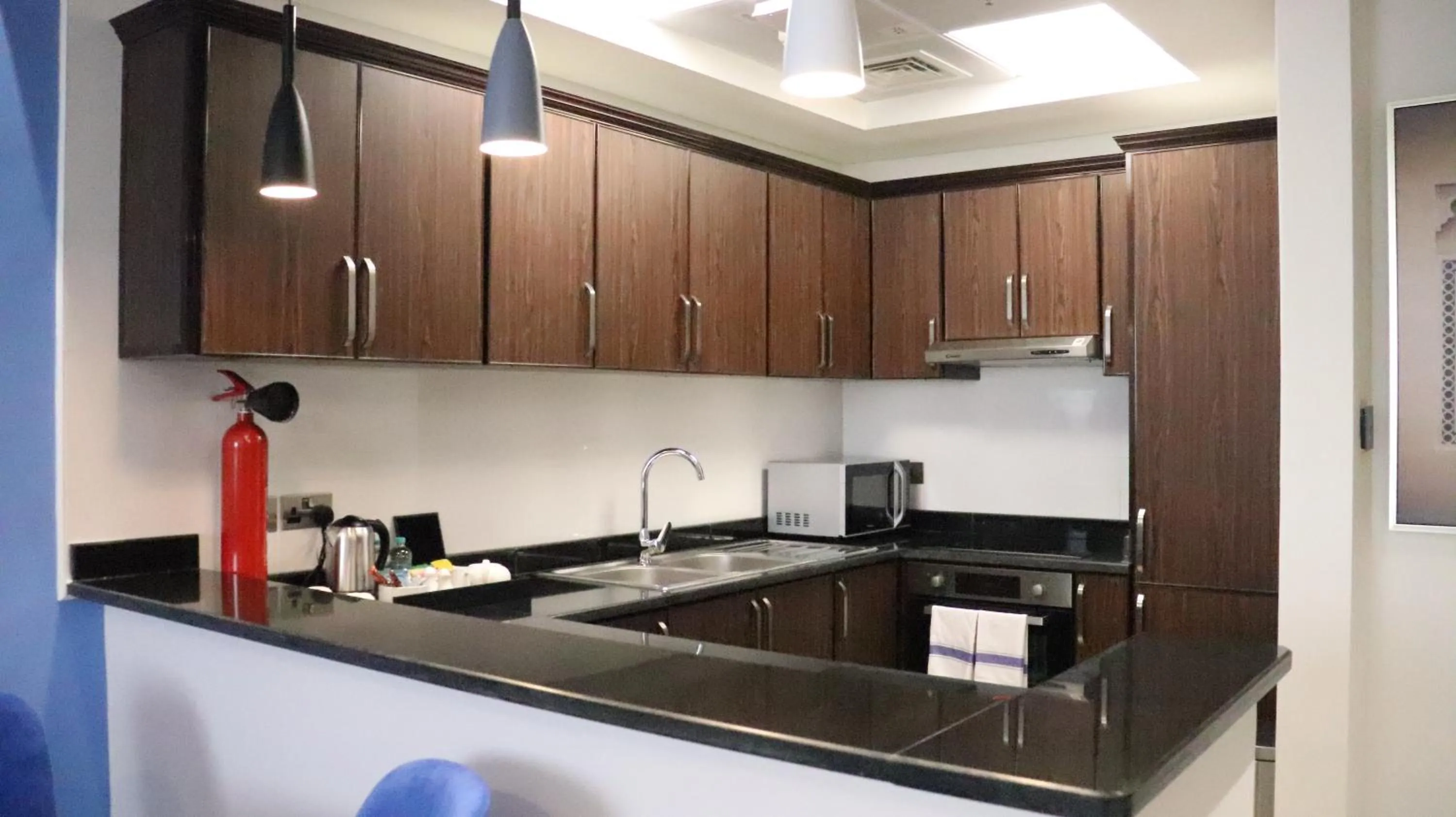 Kitchen or kitchenette in Al Riyadh Hotel Apartments