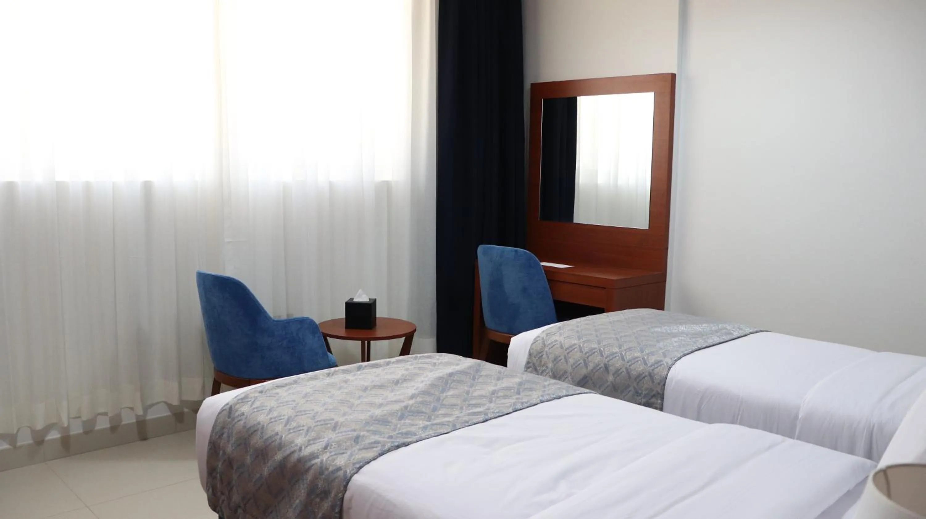 Bed in Al Riyadh Hotel Apartments