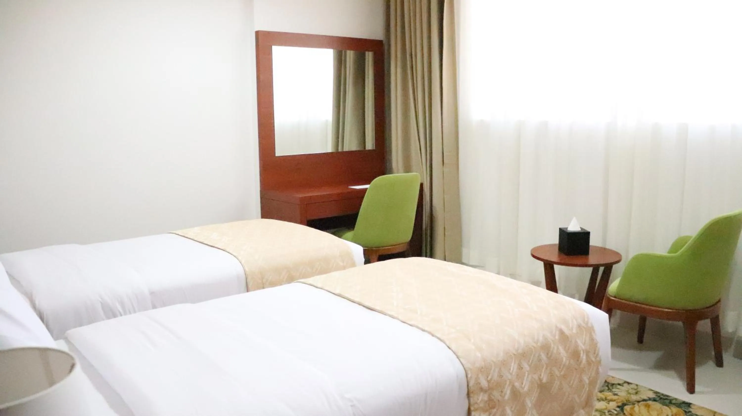 Bed in Al Riyadh Hotel Apartments