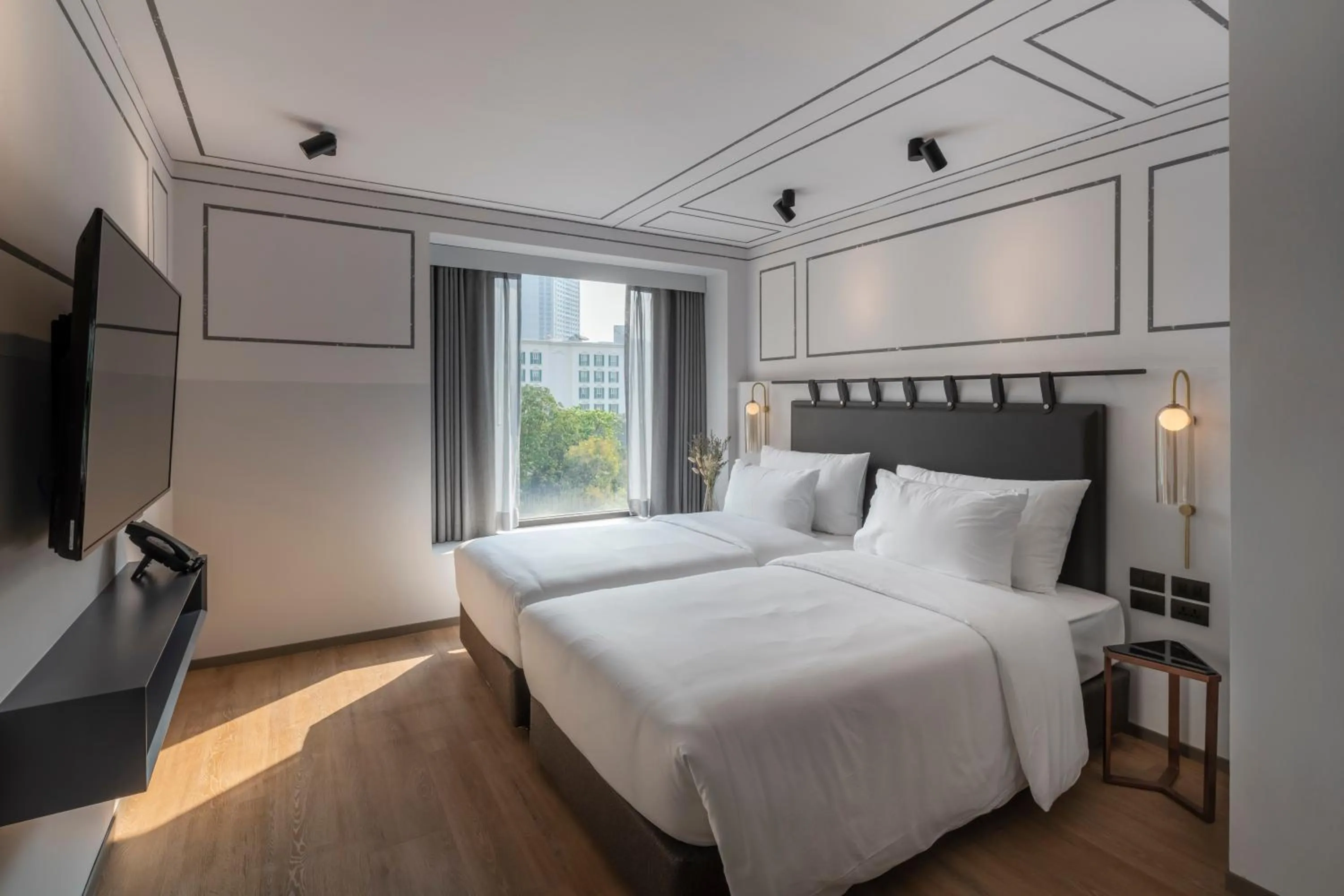 Bed in PASSA Hotel Bangkok