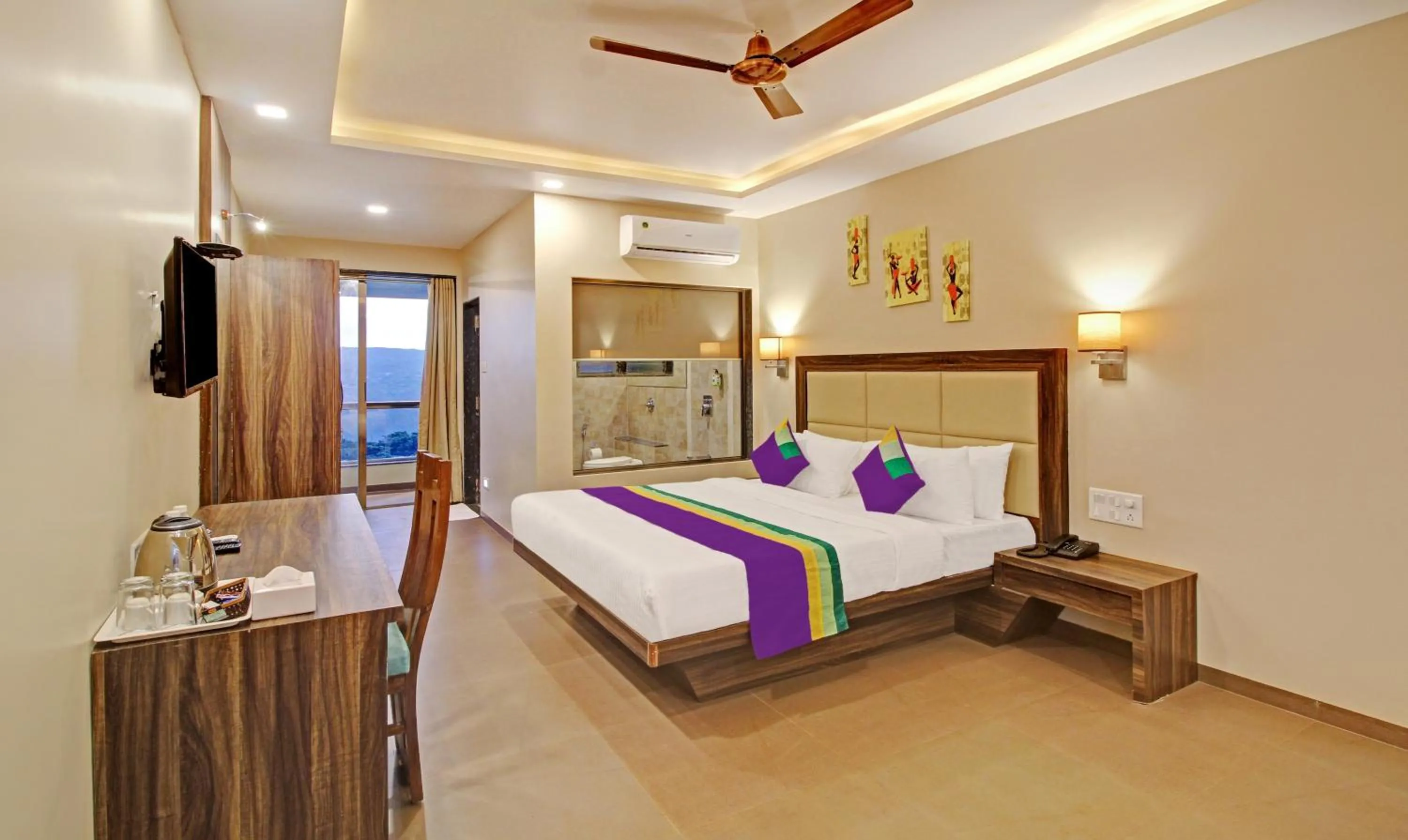 Photo of the whole room in Treebo Mountain Retreat Mahabaleshwar, 600 Mtrs From Lingmala Waterfall