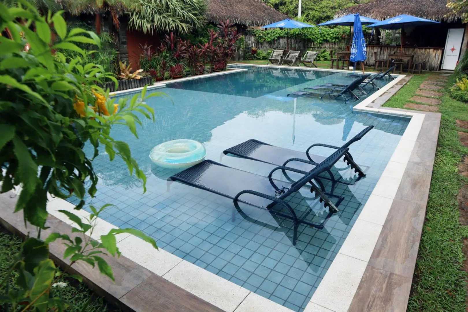 Pool view in Pousada Vila Camurim