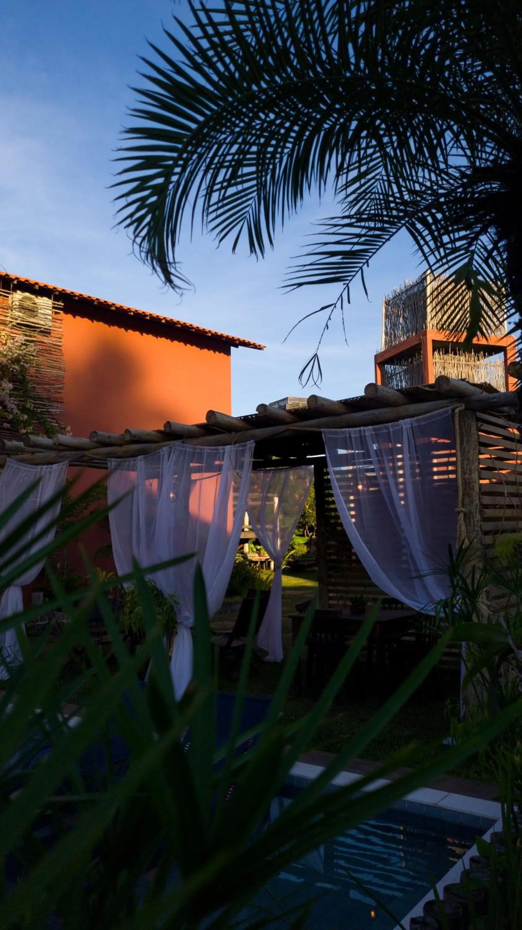 Pool view in Pousada Vila Camurim