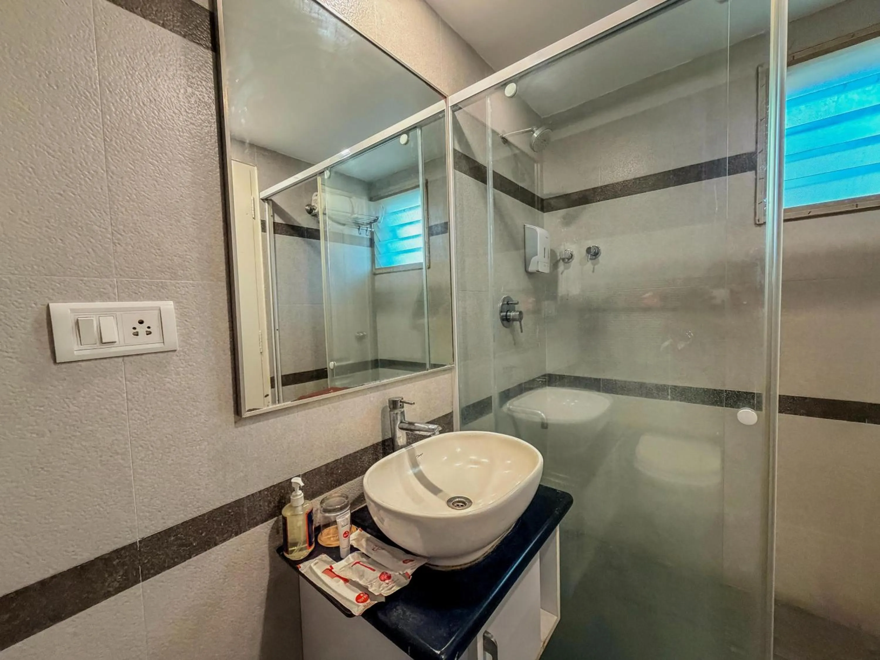 Shower in Zip By Spree Hotels Surabi International Vellore