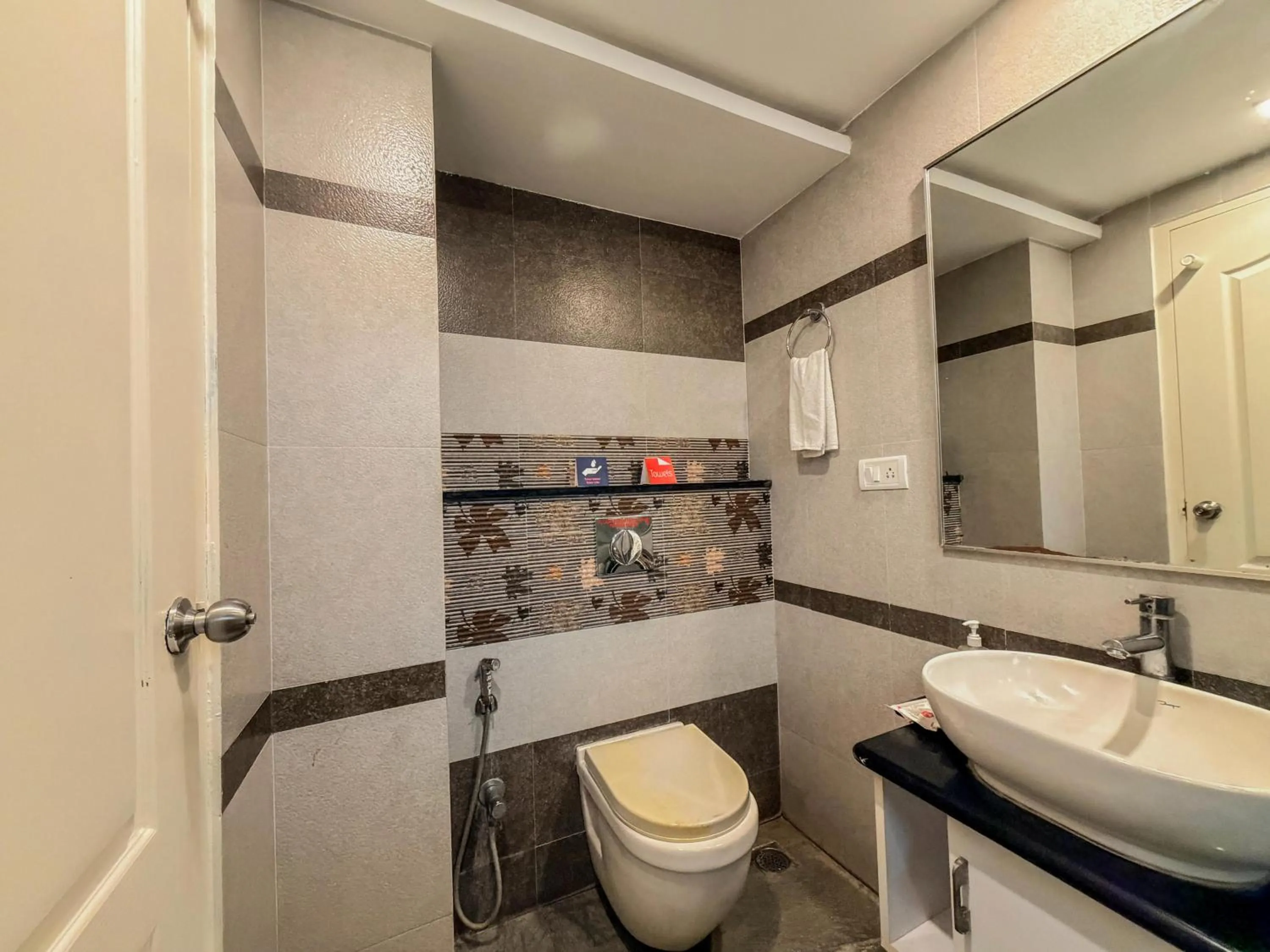 Shower in Zip By Spree Hotels Surabi International Vellore