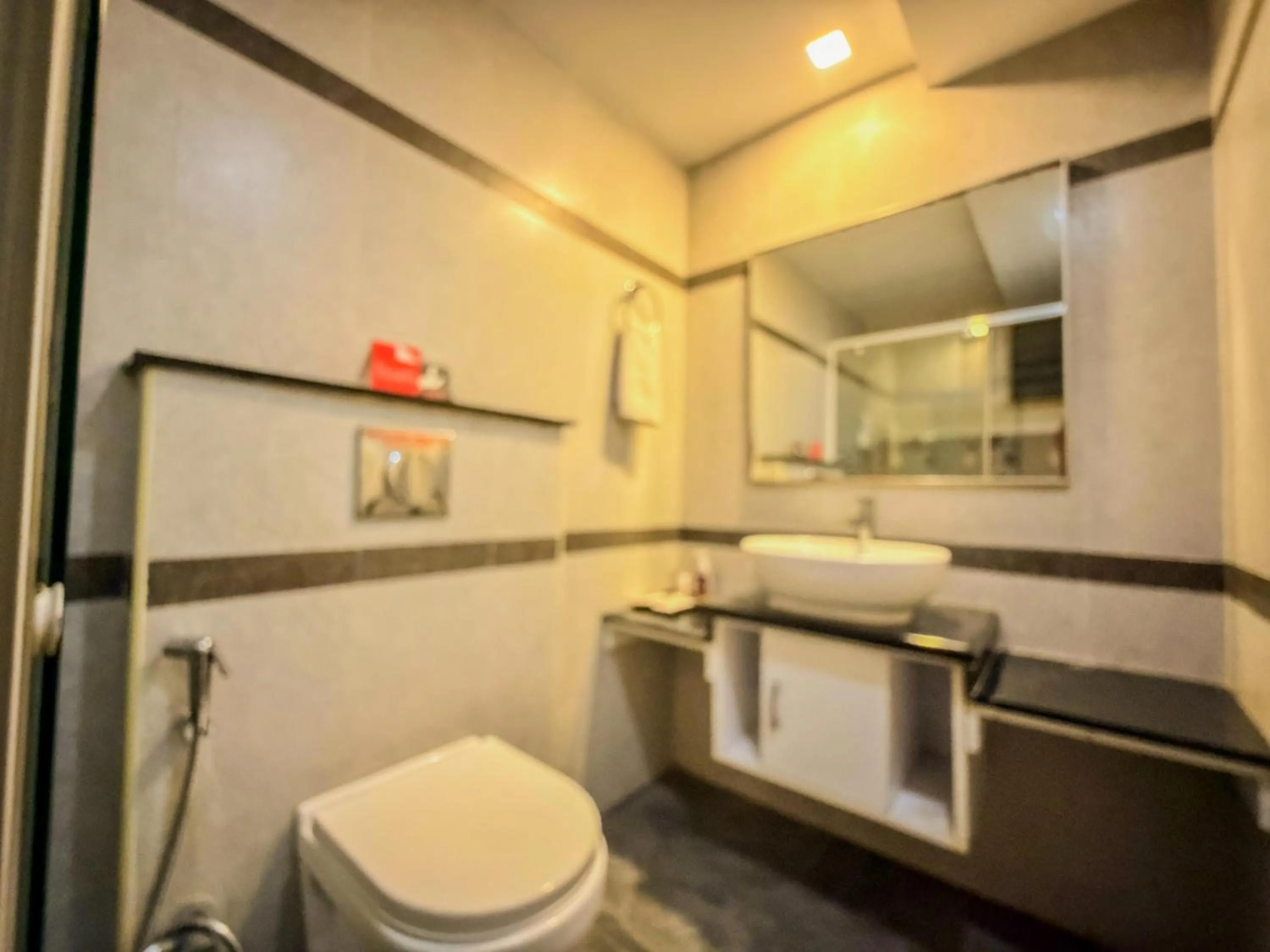 Shower in Zip By Spree Hotels Surabi International Vellore