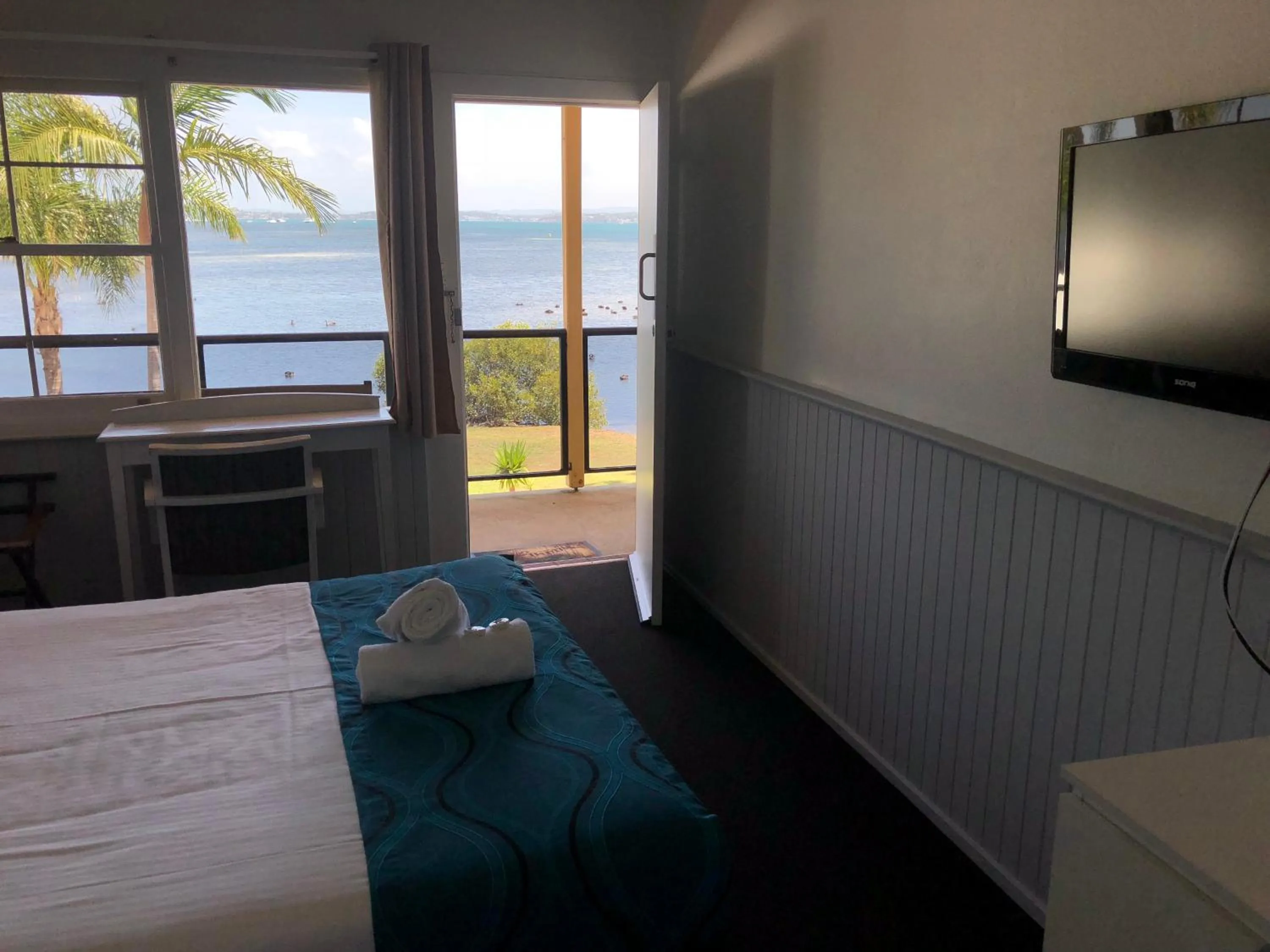 Bed in Squid's Ink Motel