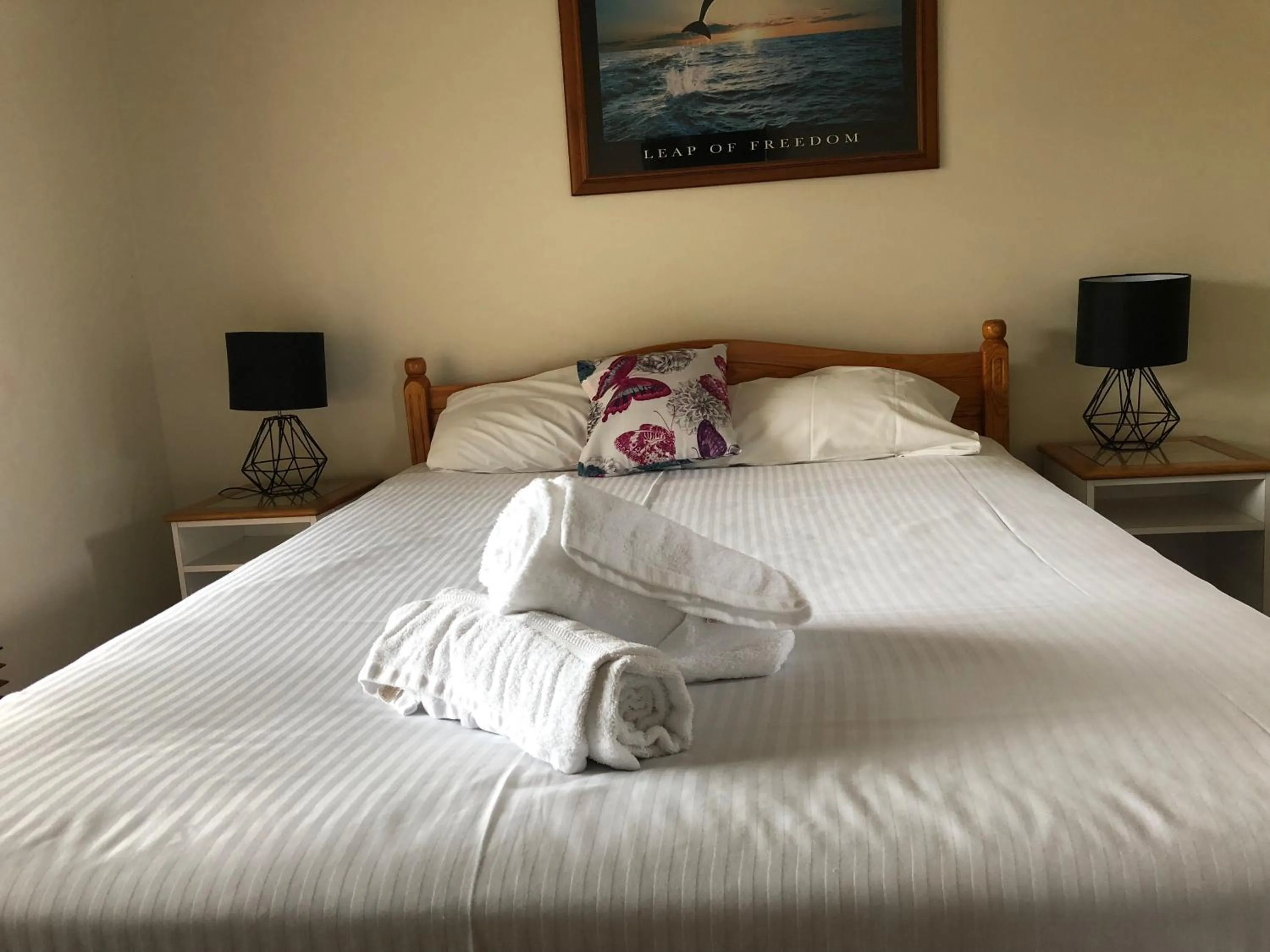 Bed in Squid's Ink Motel