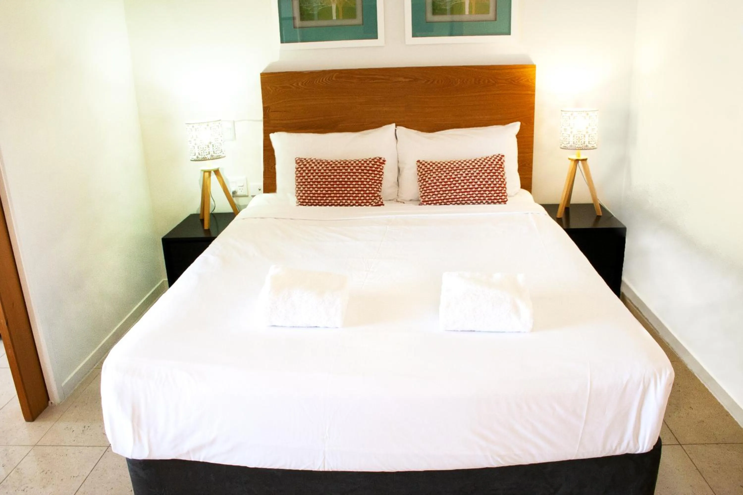 Bed in Oshen Holiday Apartments Yeppoon