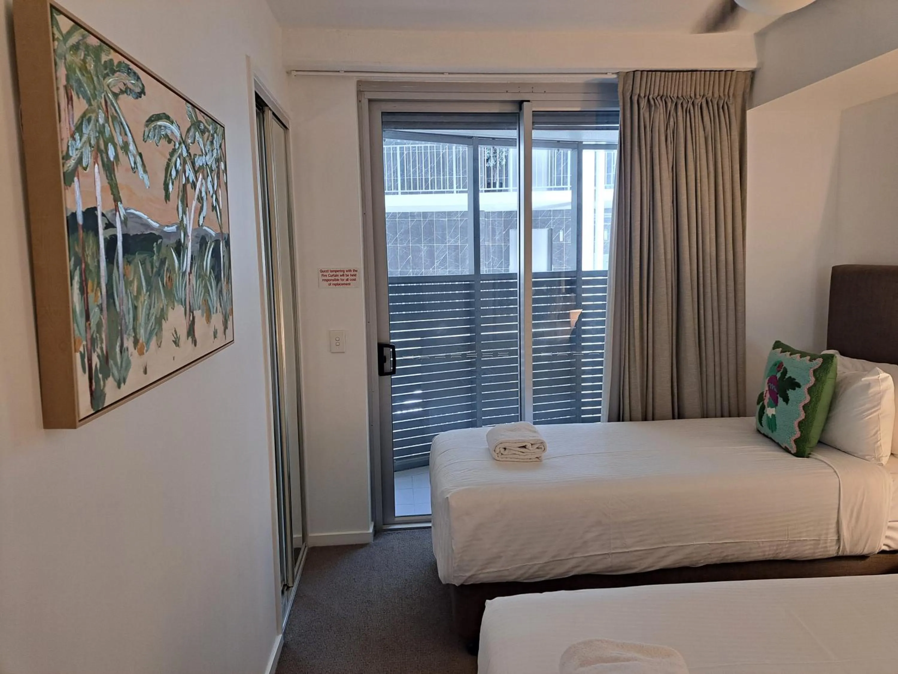 Bed in Oshen Holiday Apartments Yeppoon