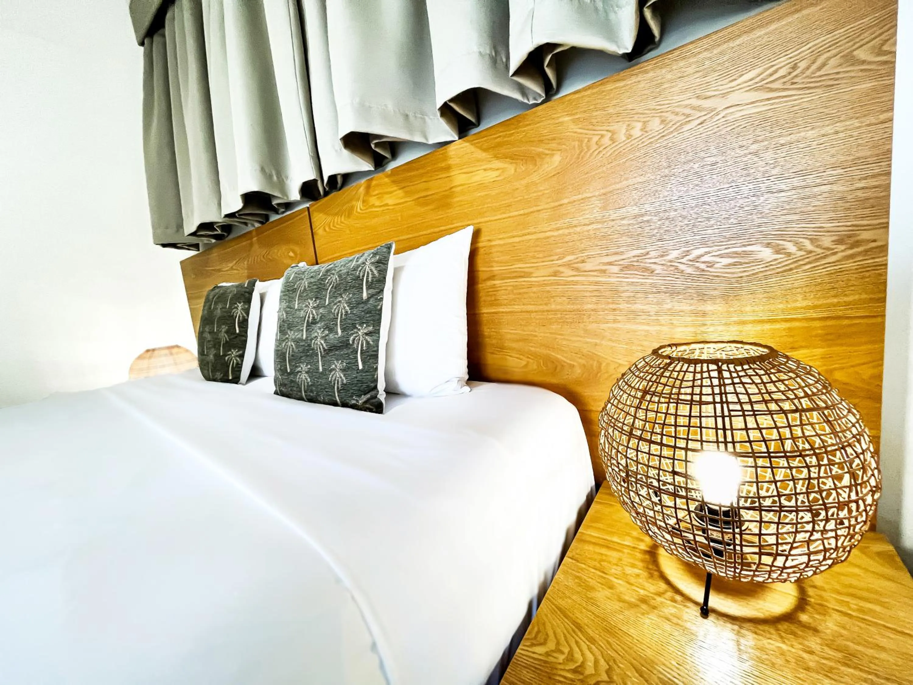 Bed in Oshen Holiday Apartments Yeppoon