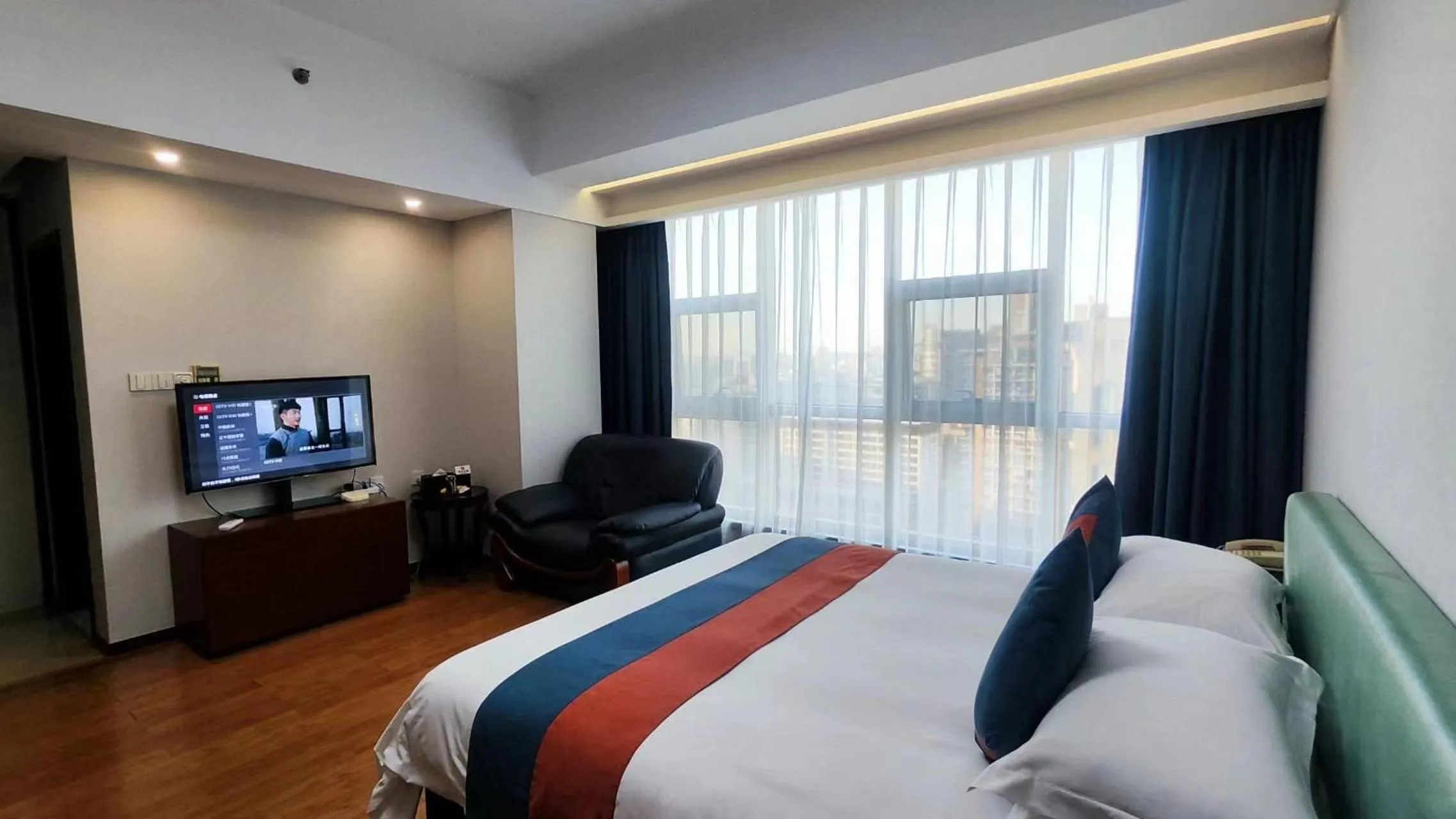 Communal lounge/ TV room in East King Business Hotel (West Lake store, Hangzhou)