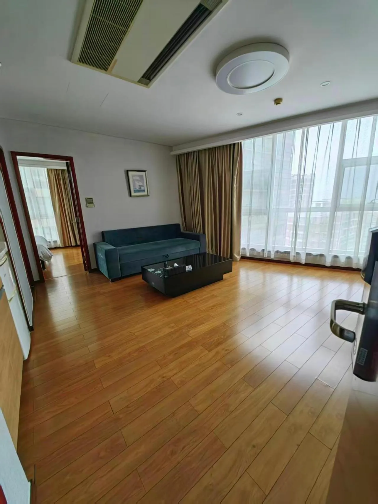 Living room in East King Business Hotel (West Lake store, Hangzhou)