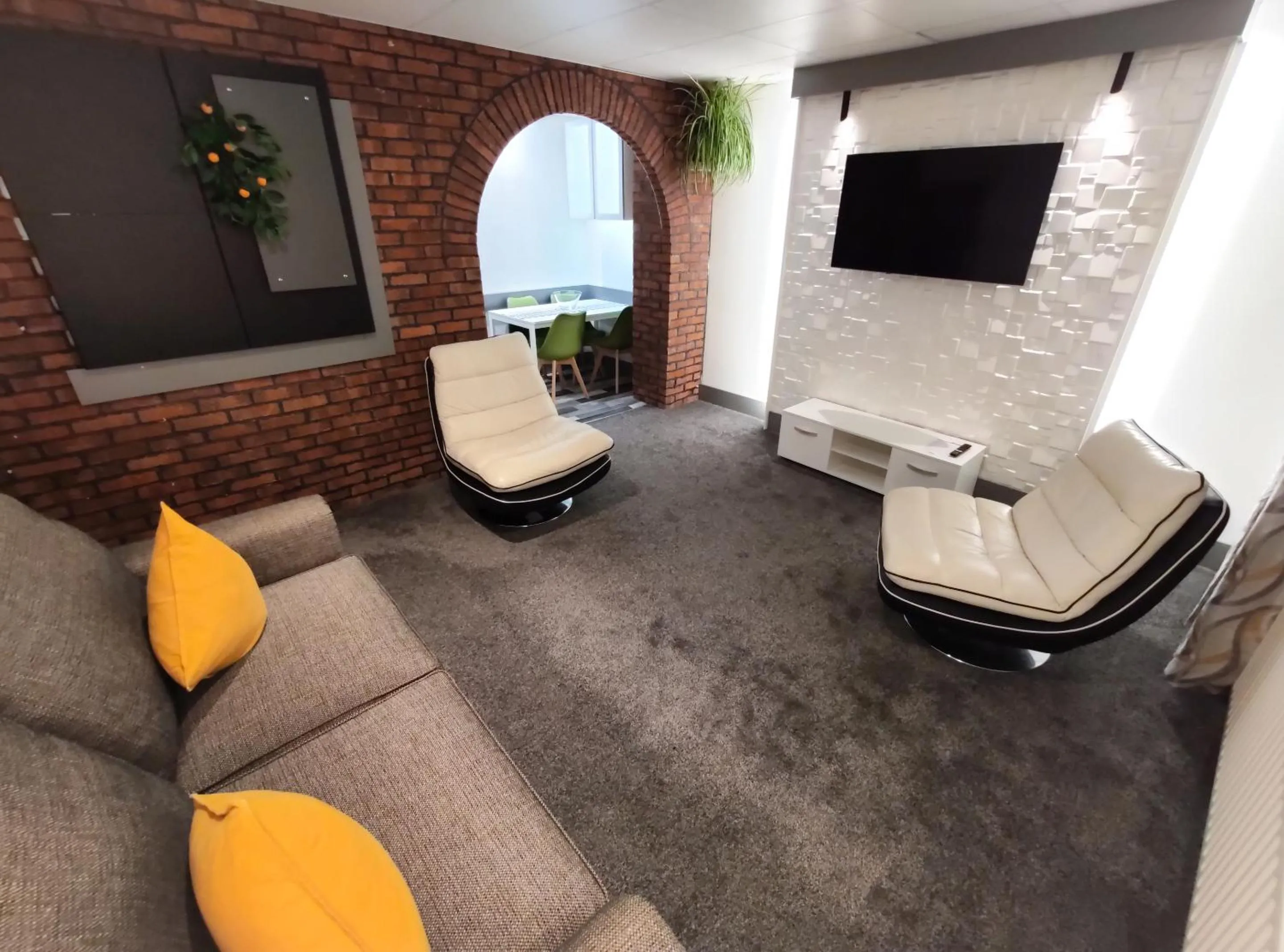 Living room in The Bawdens Holiday Apartments