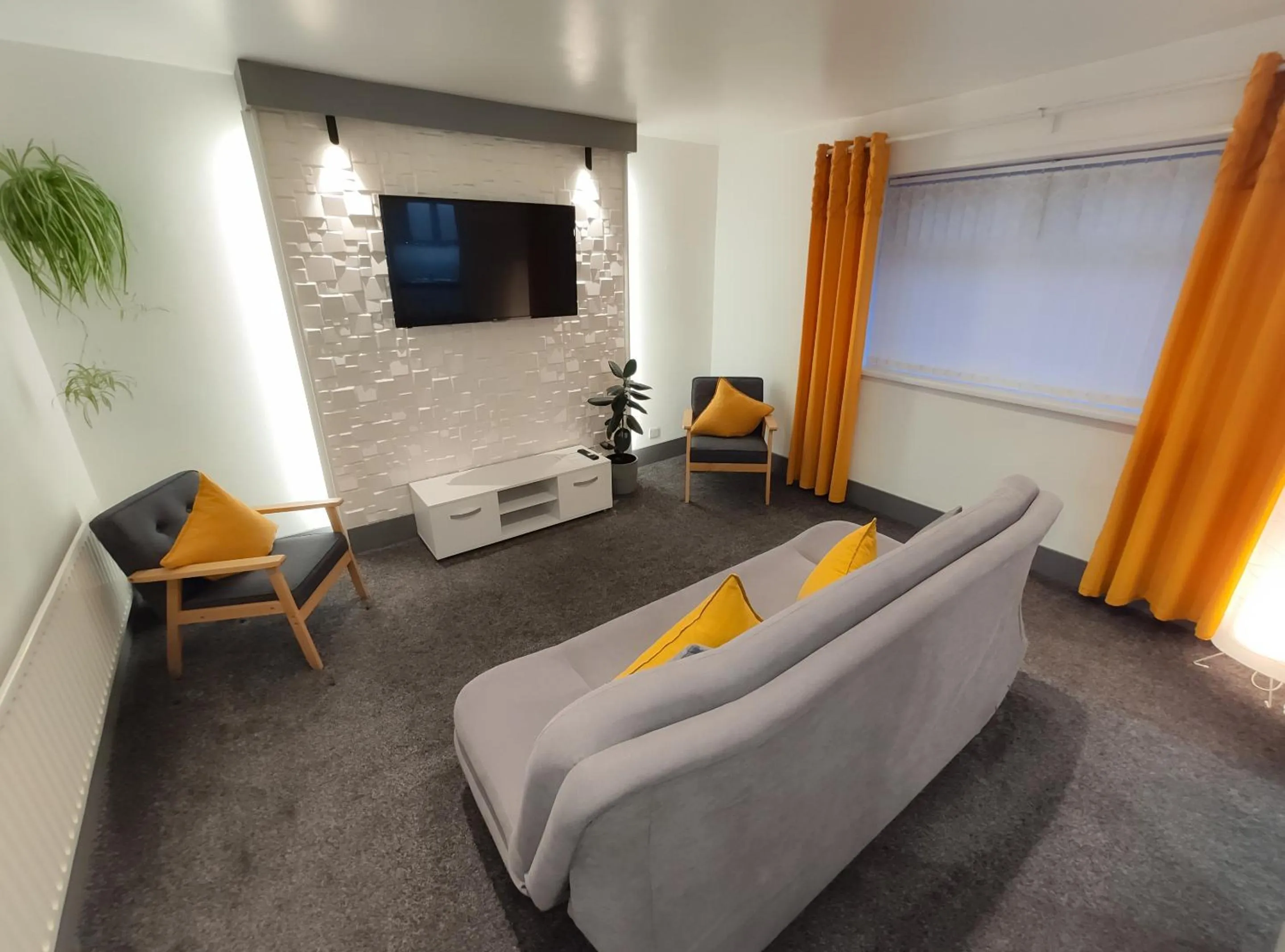 Living room in The Bawdens Holiday Apartments