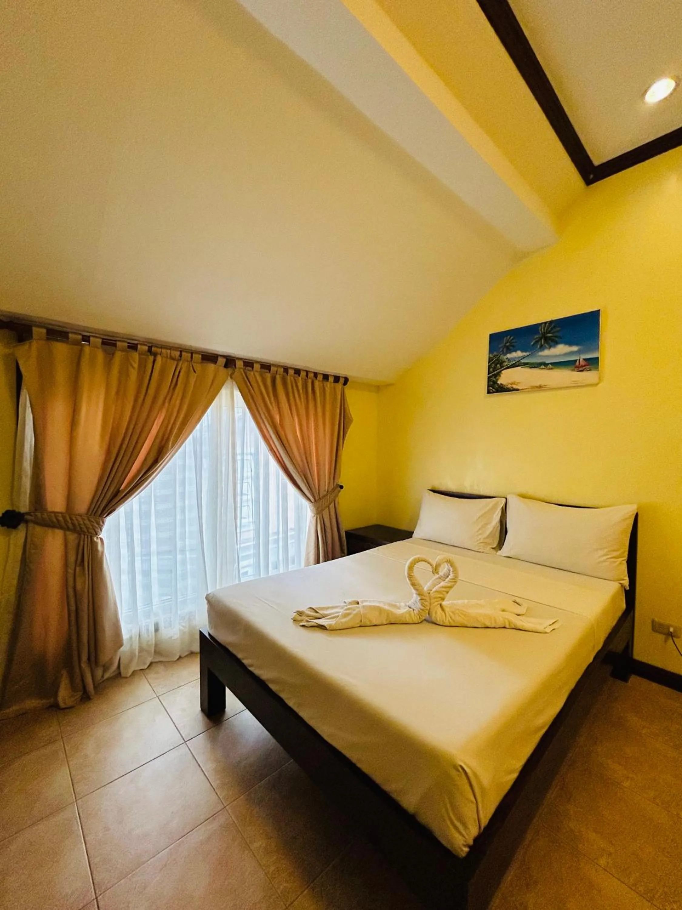 Bed in Sheridan Villas Boracay