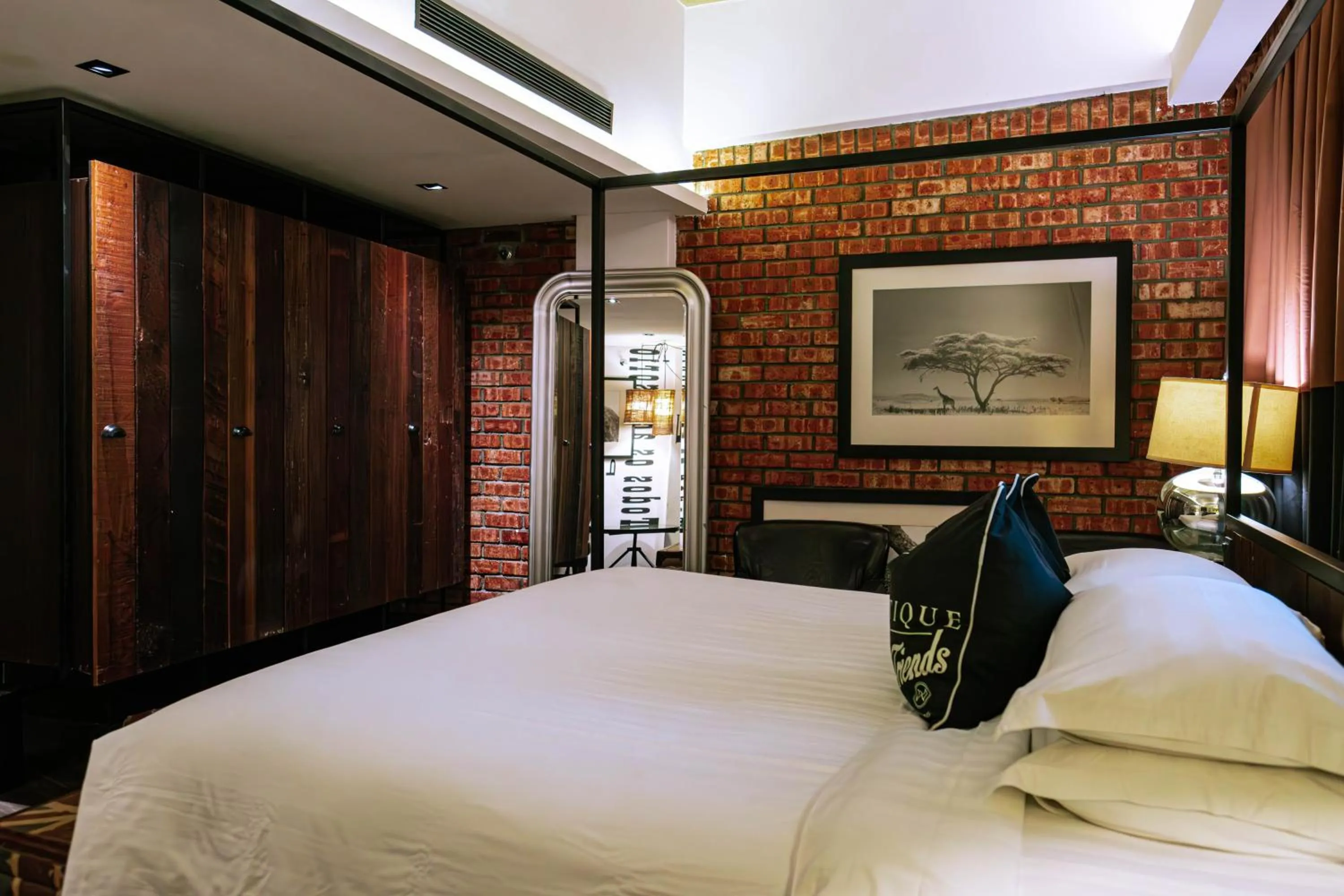 Bed in M Boutique Hotel