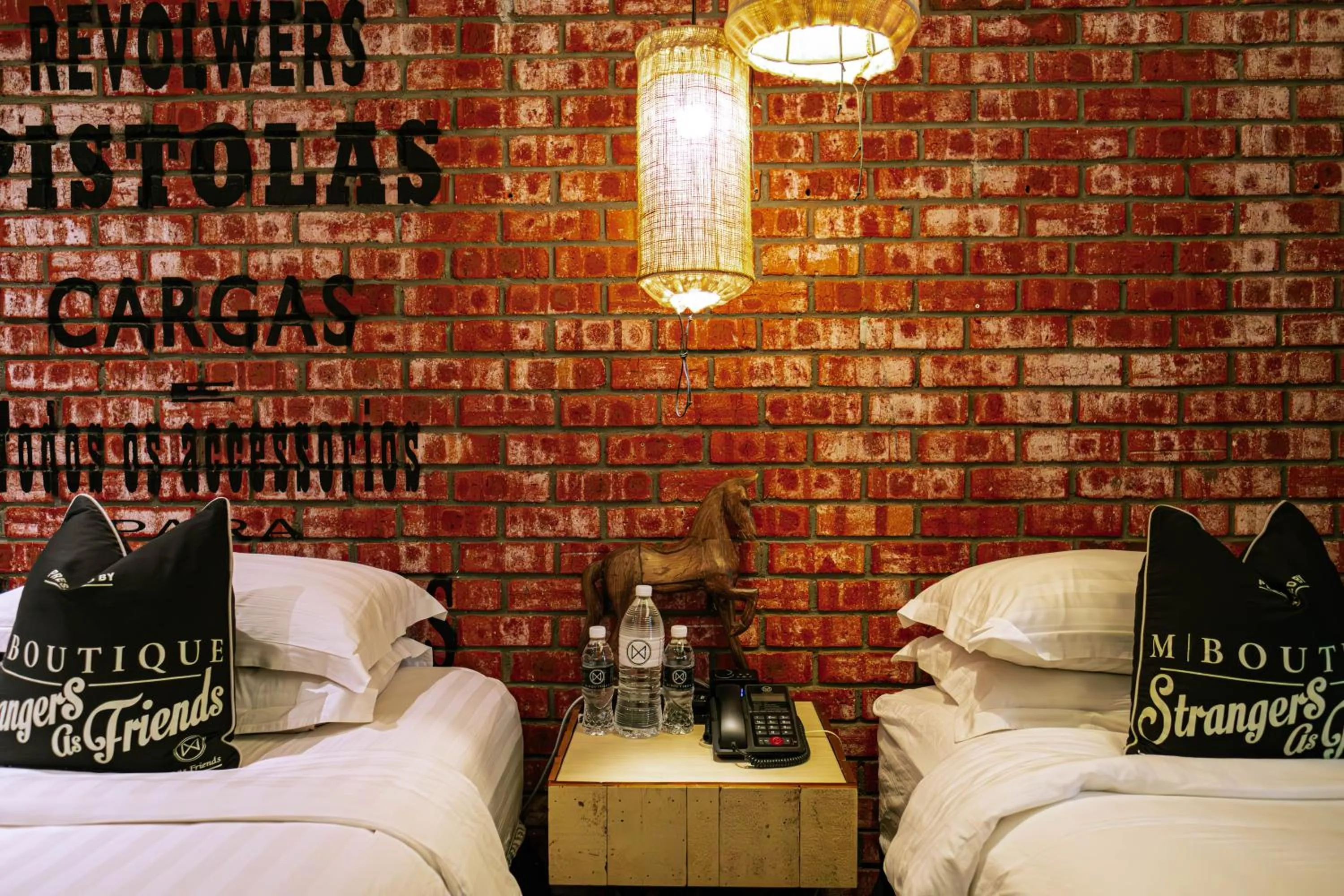 Bed in M Boutique Hotel