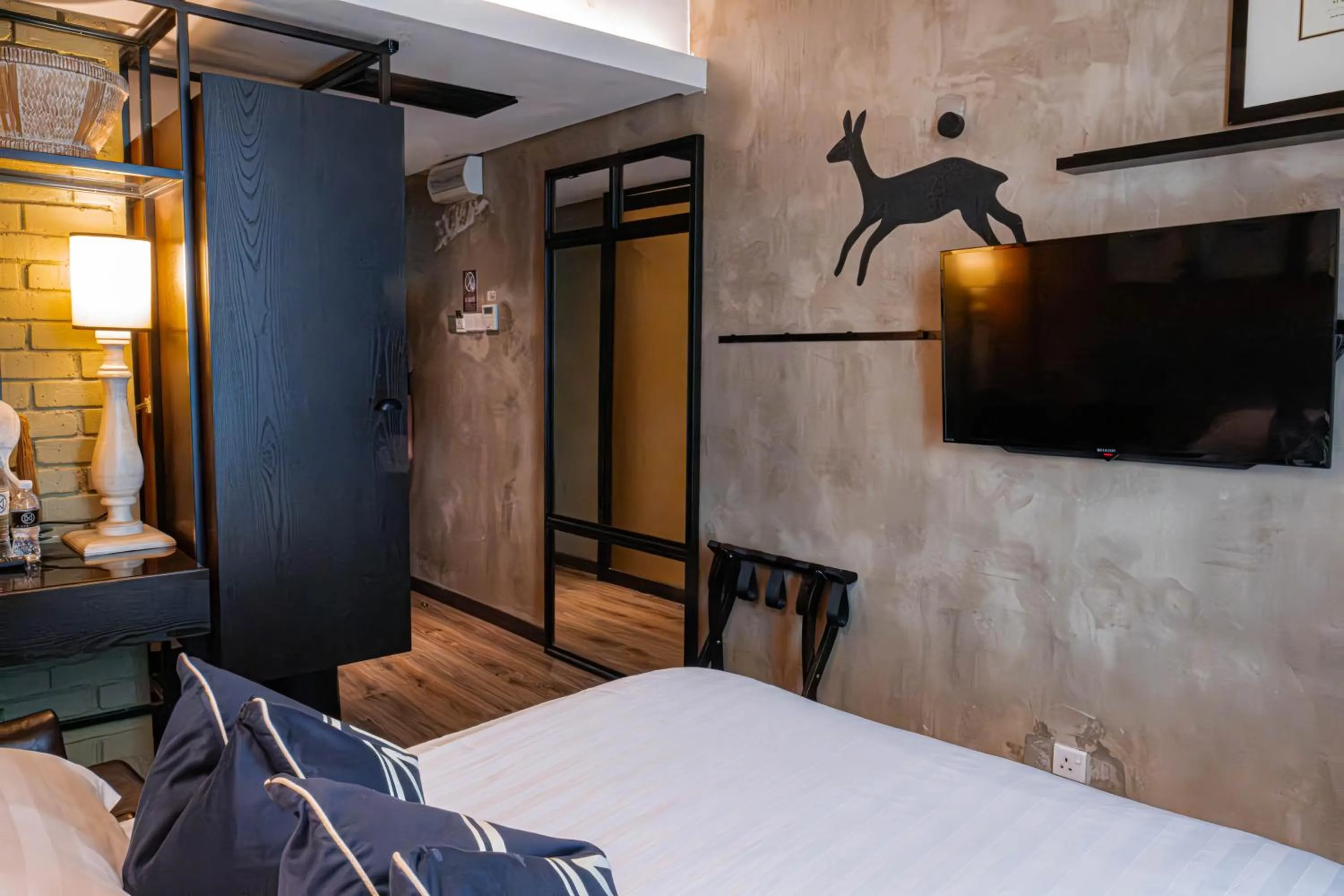 Bed in M Boutique Hotel