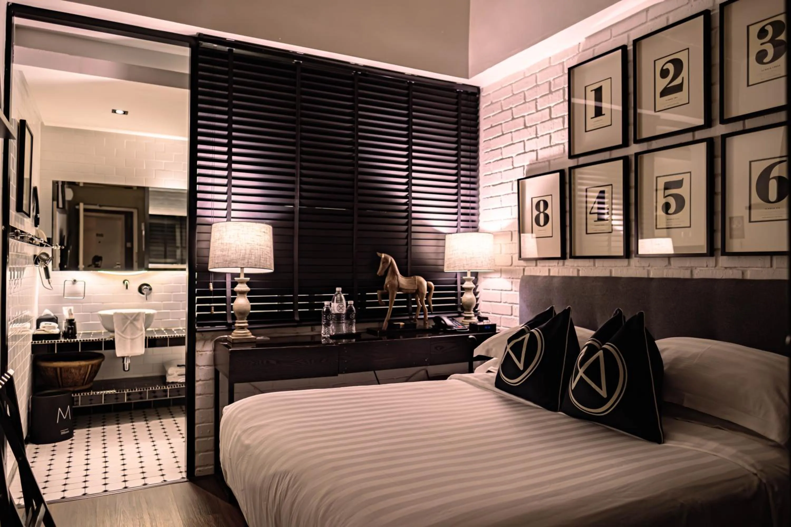 Bed in M Boutique Hotel