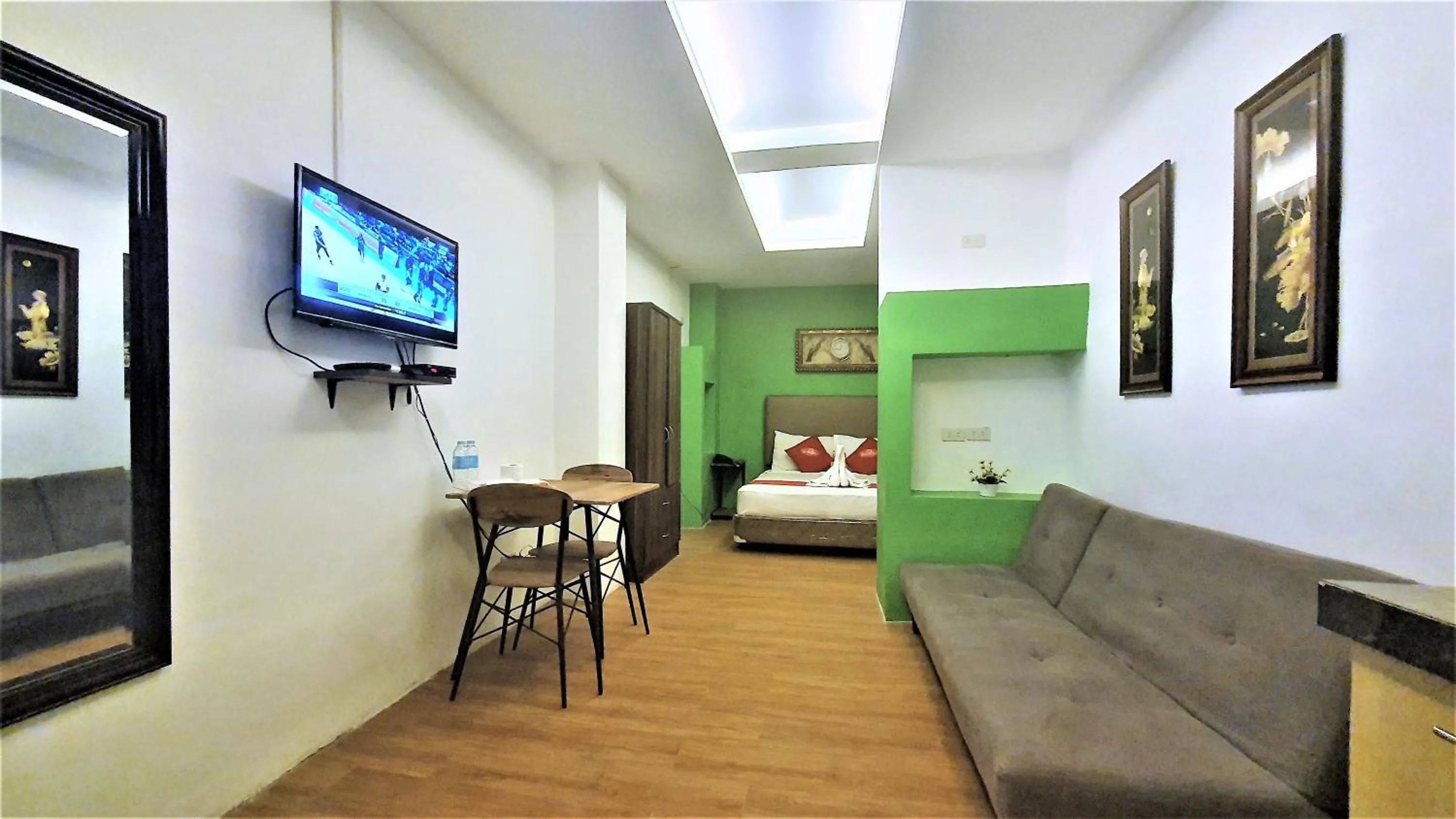 Property building, Bed in Spiral Suites Hotel