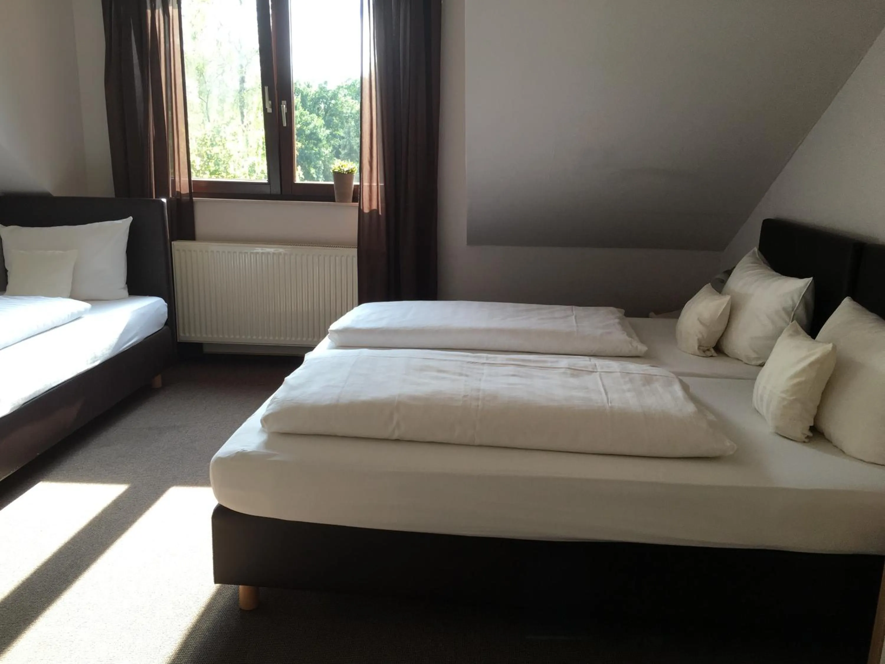 Photo of the whole room, Bed in Landhaus Hotel Göke