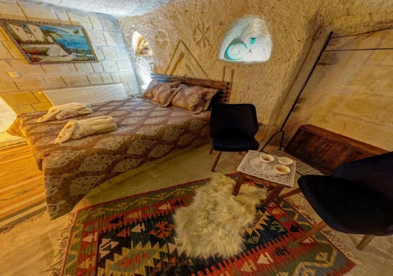 Living room, Bed in Cappadocia Alaz Cave Otel