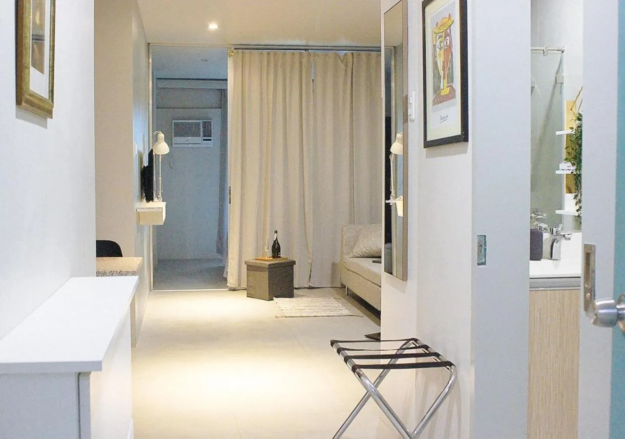 Bedroom in GMRENTALS Apartment at Mactan Airport