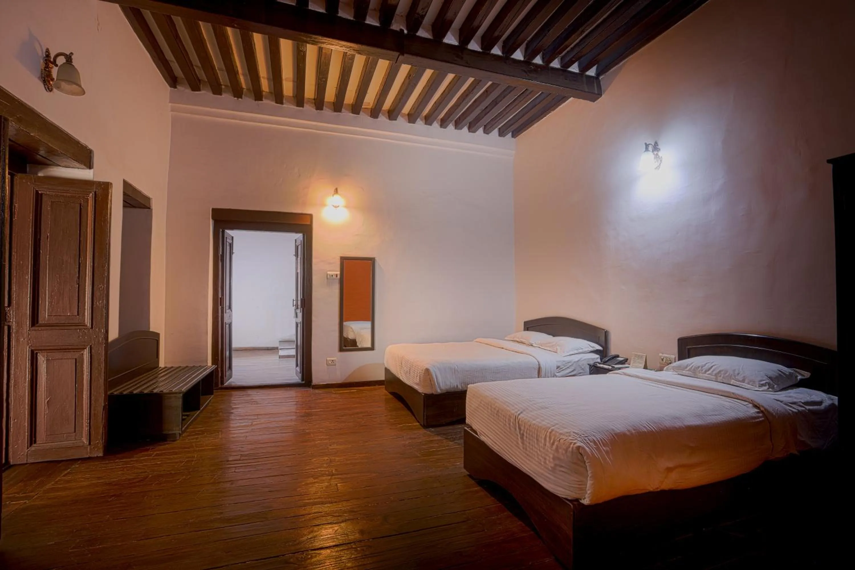 Bed in Hukum Darbar Restaurant & Hotel