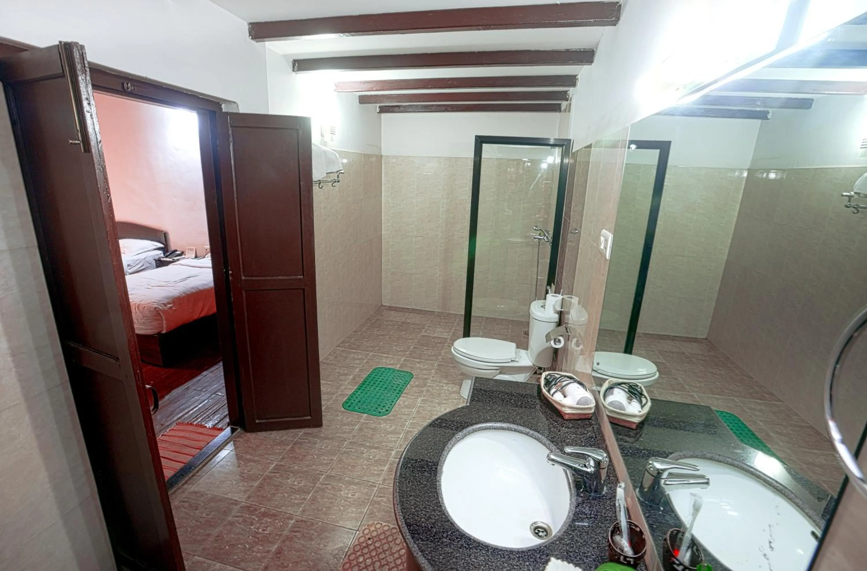 Bathroom in Hukum Darbar Restaurant & Hotel