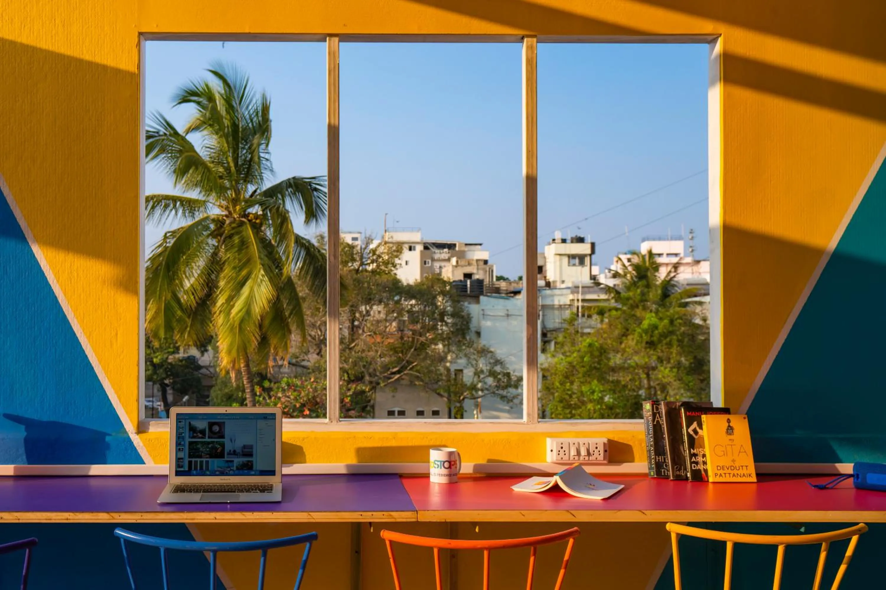 Seating area in goSTOPS Bengaluru, Gandhi Nagar Majestic