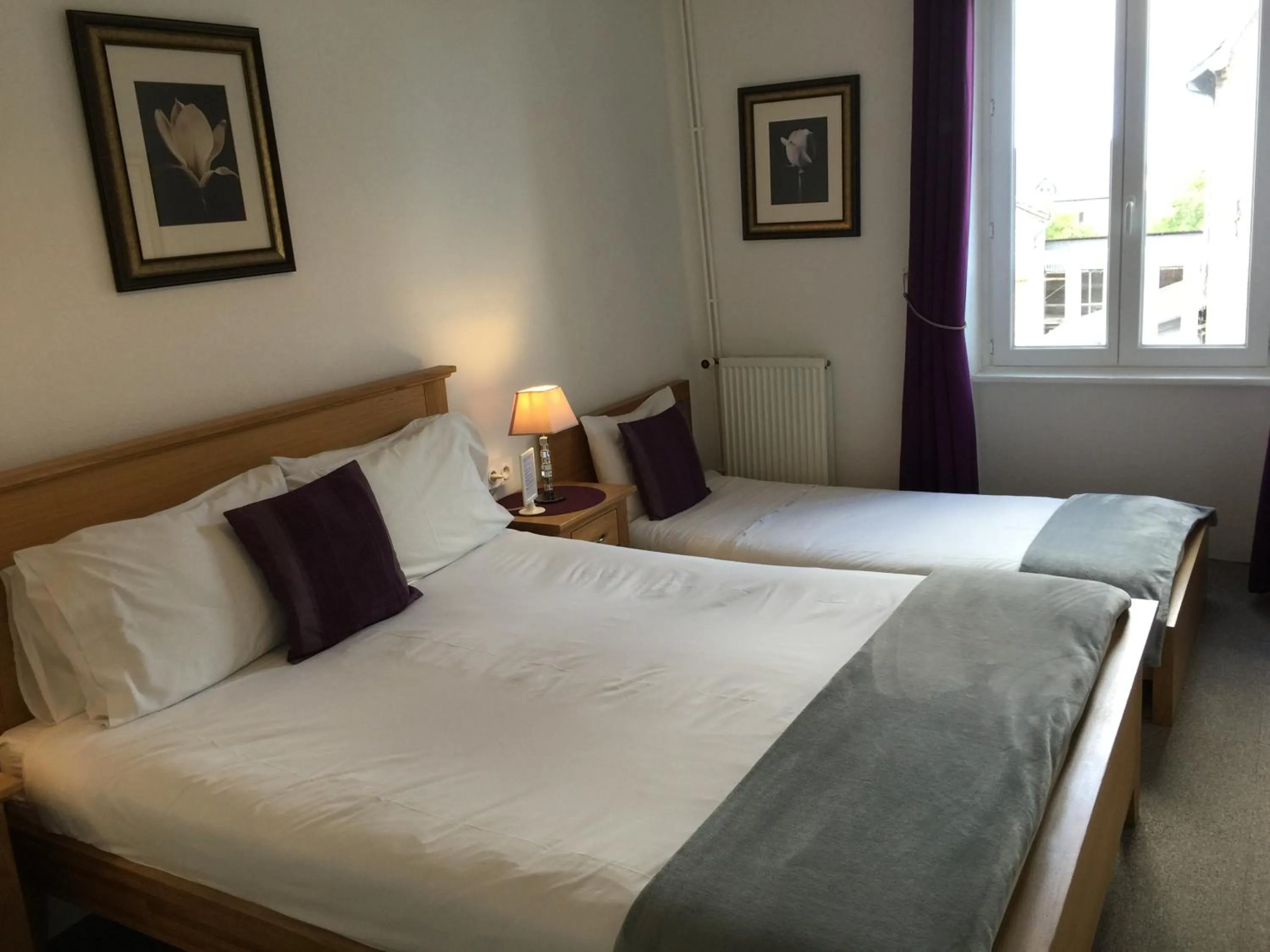 Photo of the whole room, Bed in Au Bon Accueil