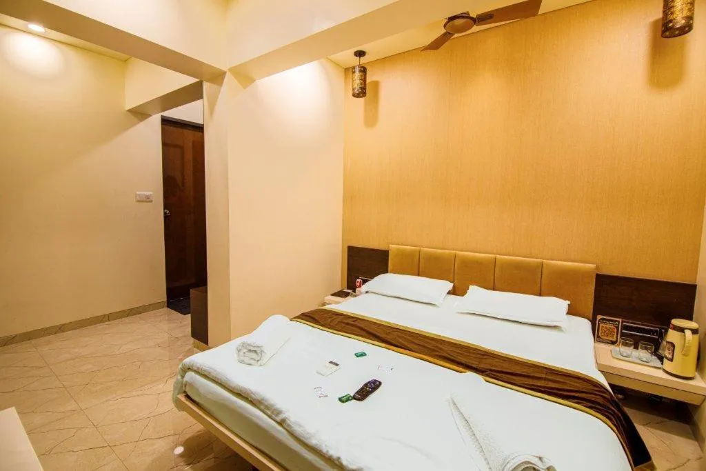 Bed in La Hotel Metro near BKC