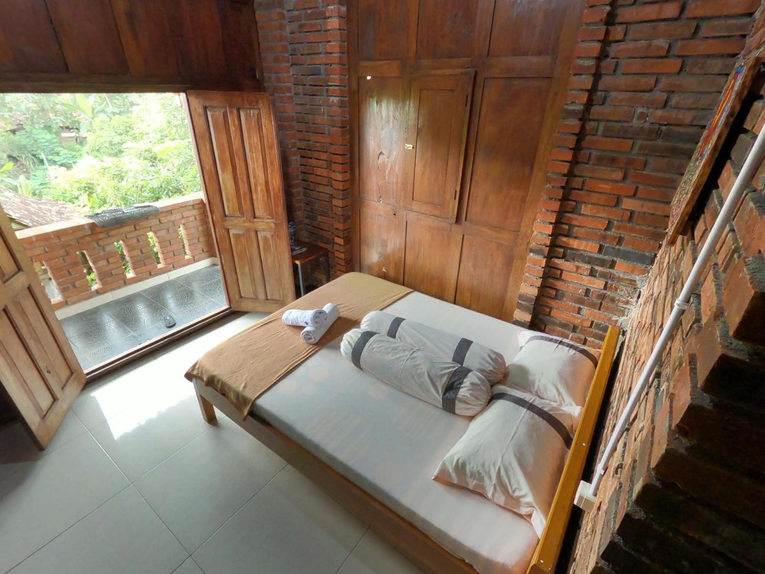 Photo of the whole room, Bed in Wisma Pancoeran