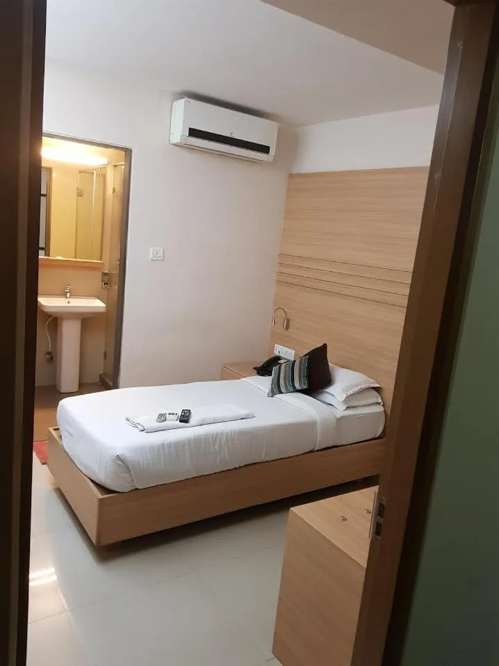 Bed in Hotel Lucky Galaxy