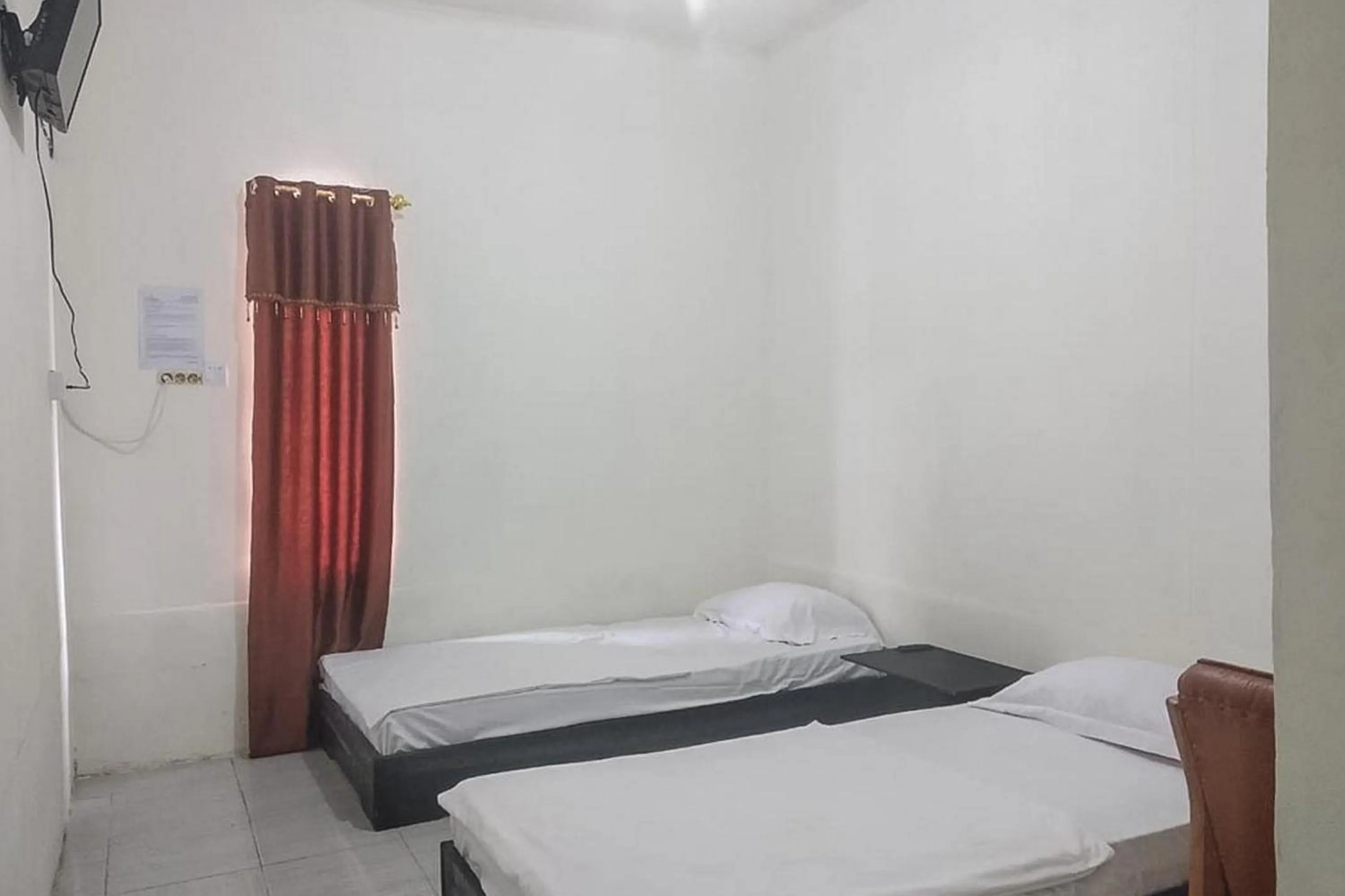 Bed in Nayla Homestay Jambi Mitra RedDoorz