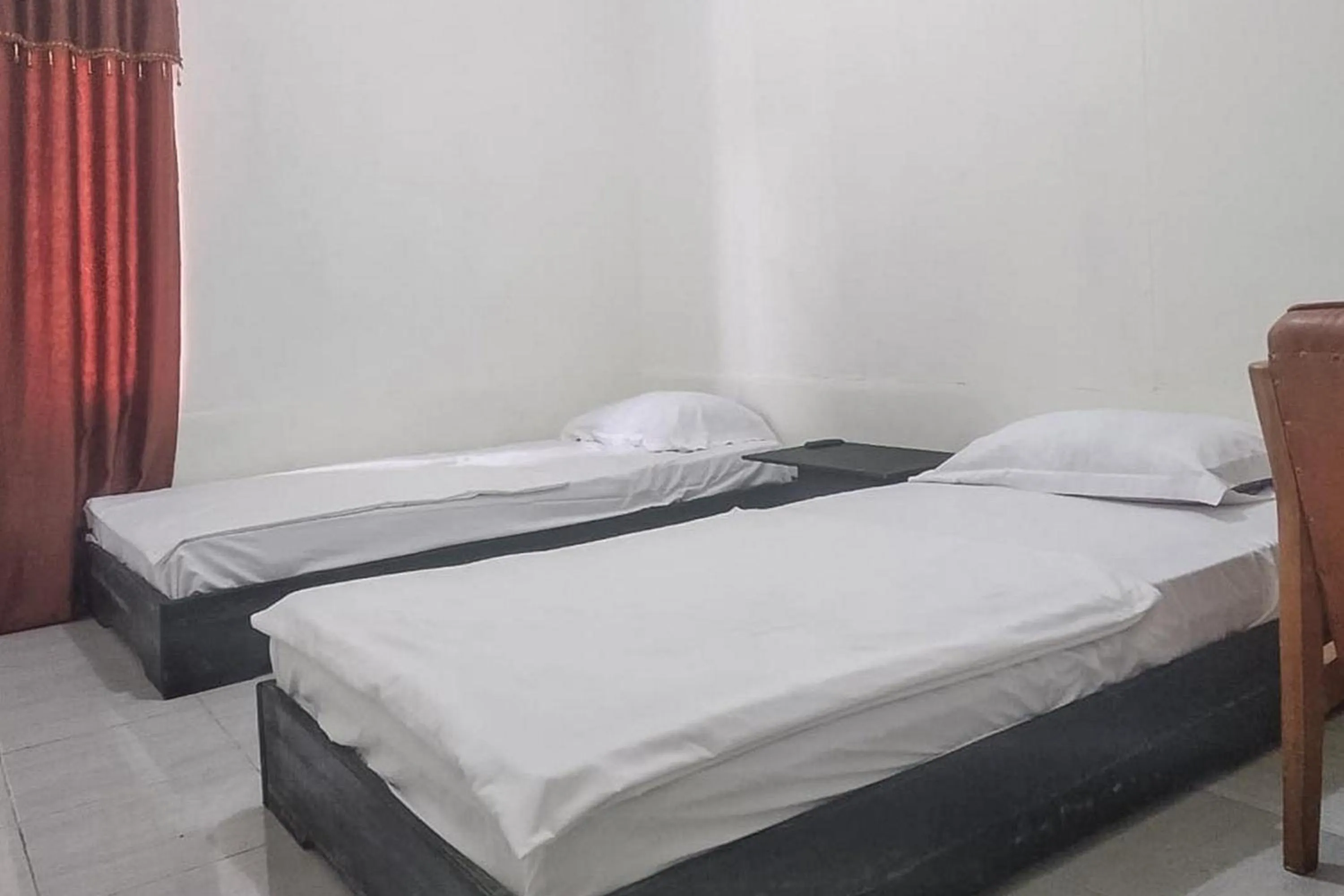 Bed in Nayla Homestay Jambi Mitra RedDoorz